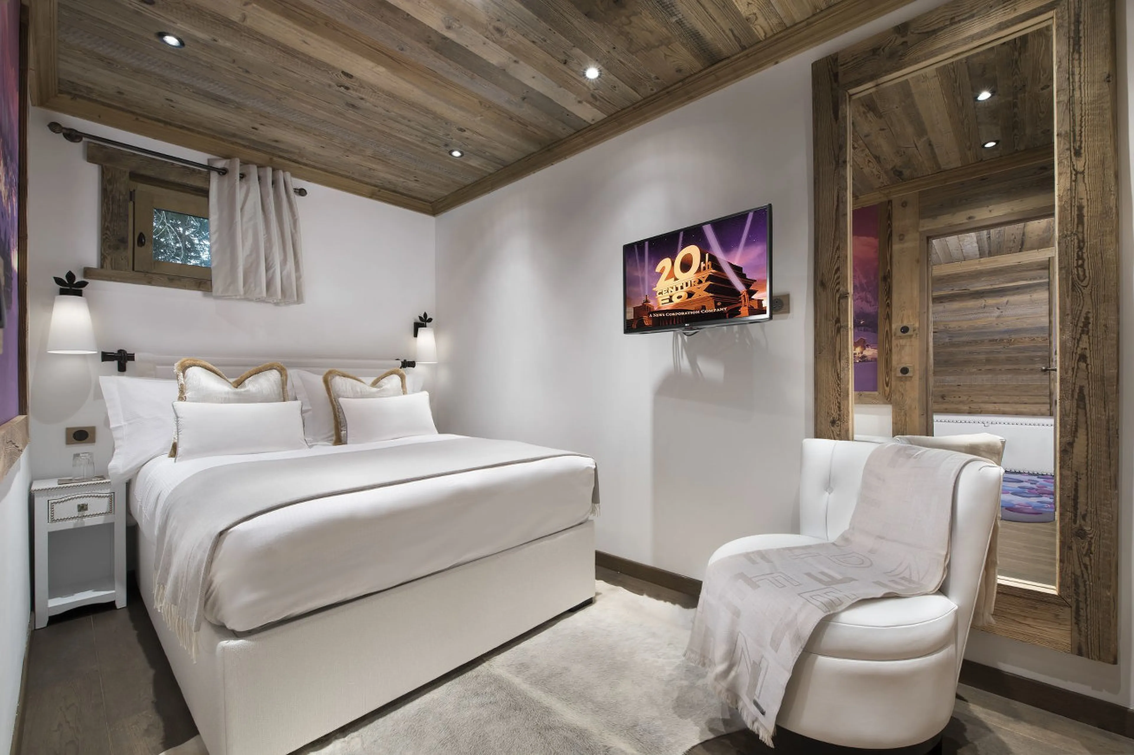Chalet La Grande Roche in Courchevel 1850 has a family room with two double beds