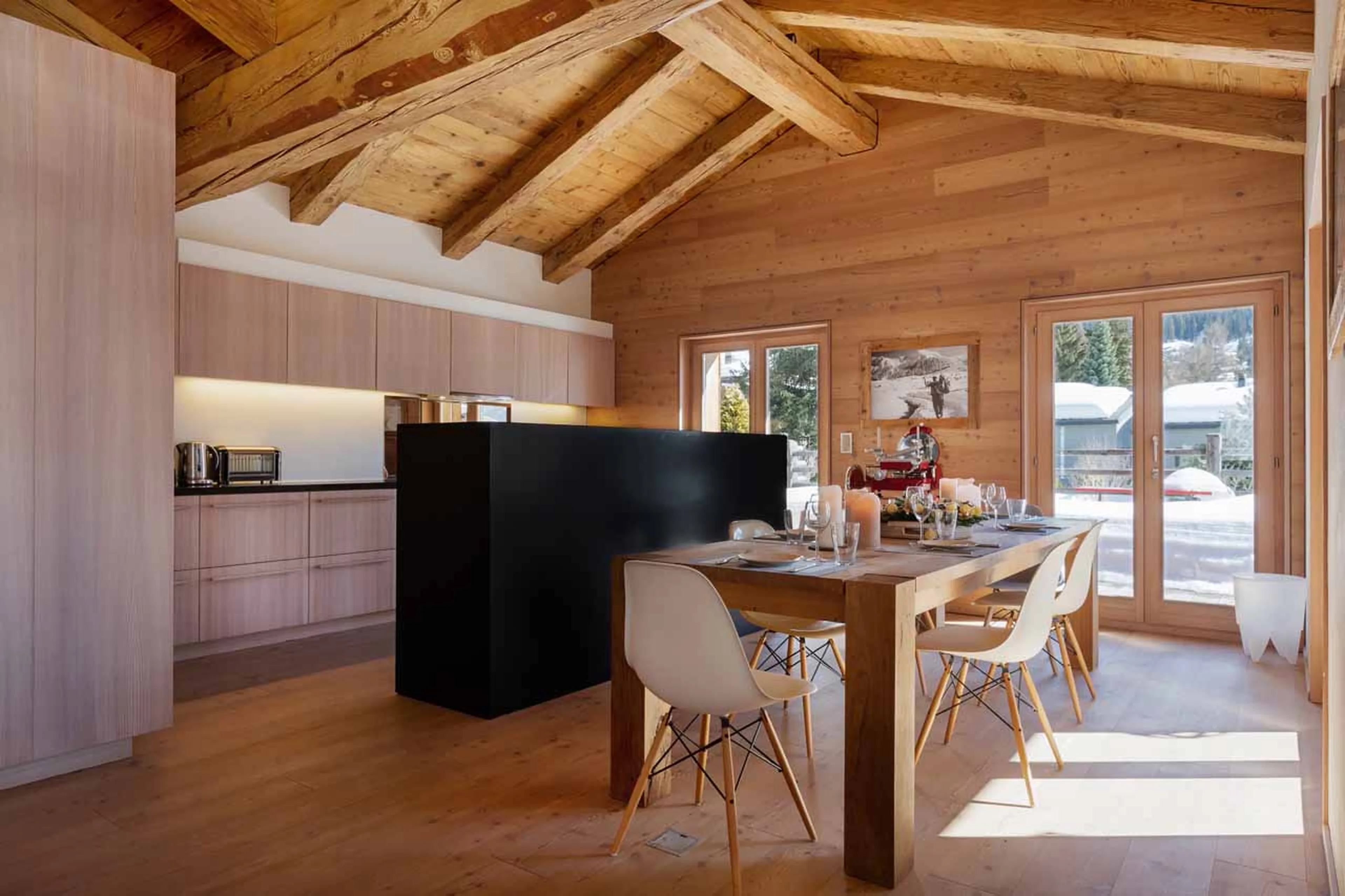 Kitchen and dining table at Chalet Granval in Verbier