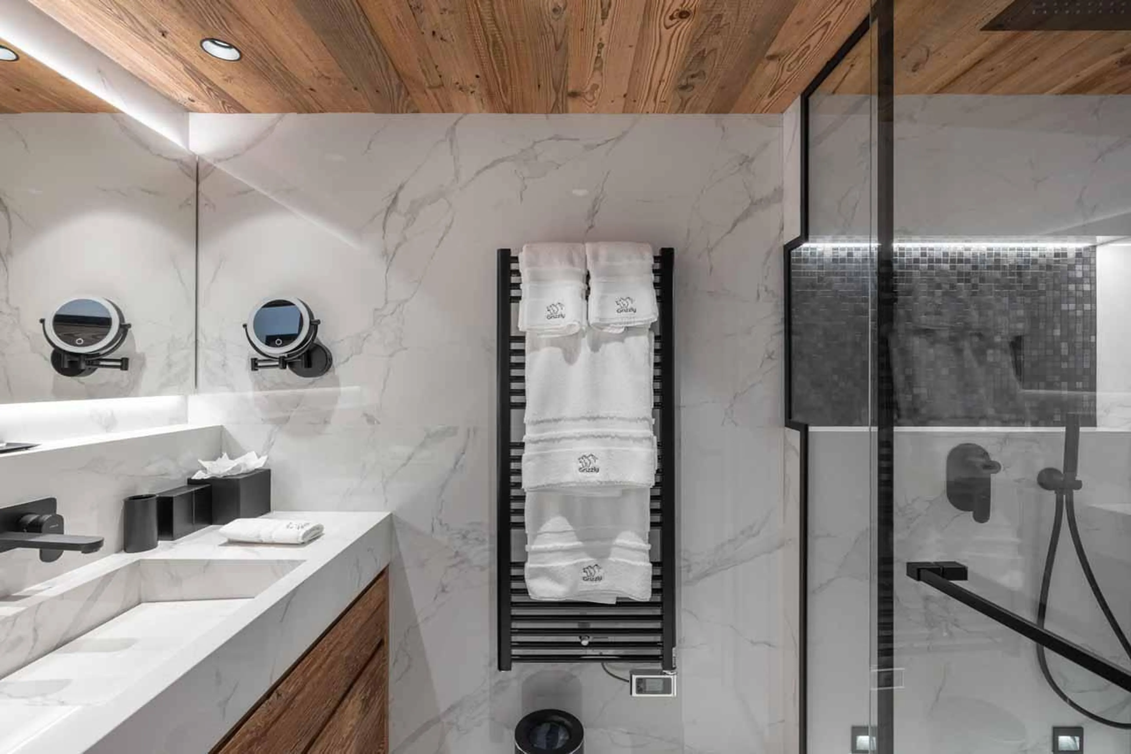 Shower room with towel rail in Chalet Grizzly, Megeve