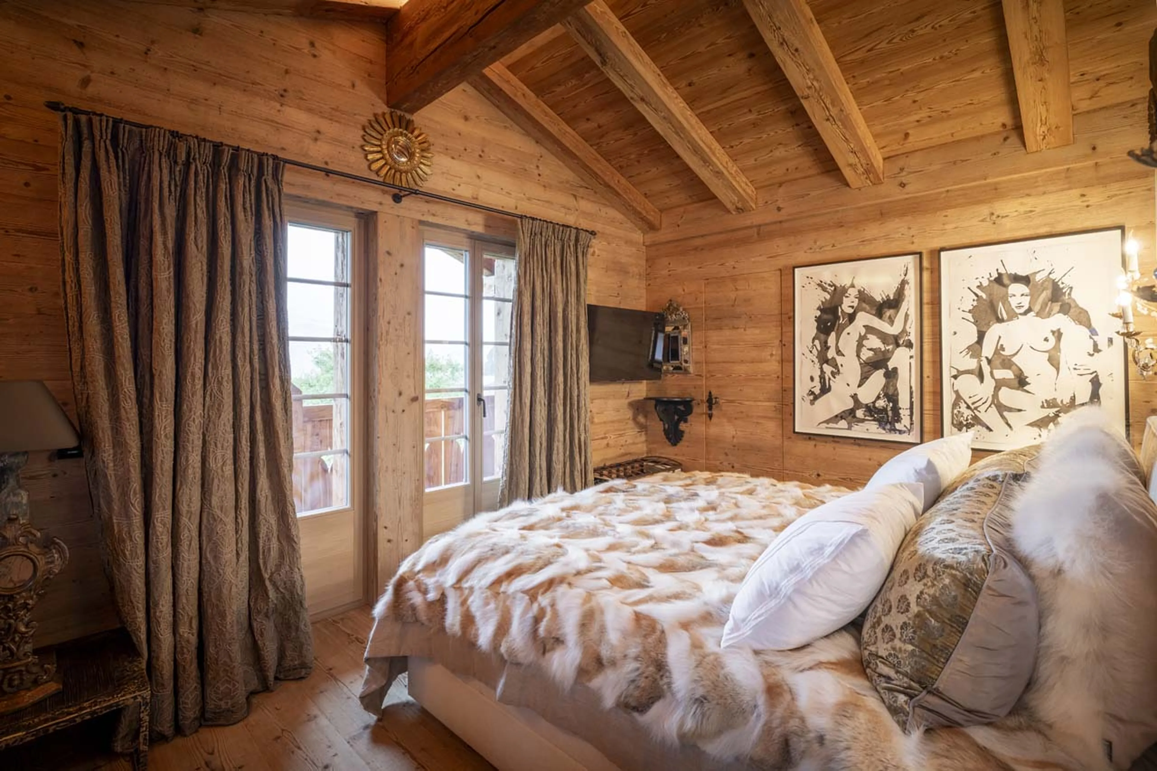 Bedroom one at Chalet Gruben in Gstaad