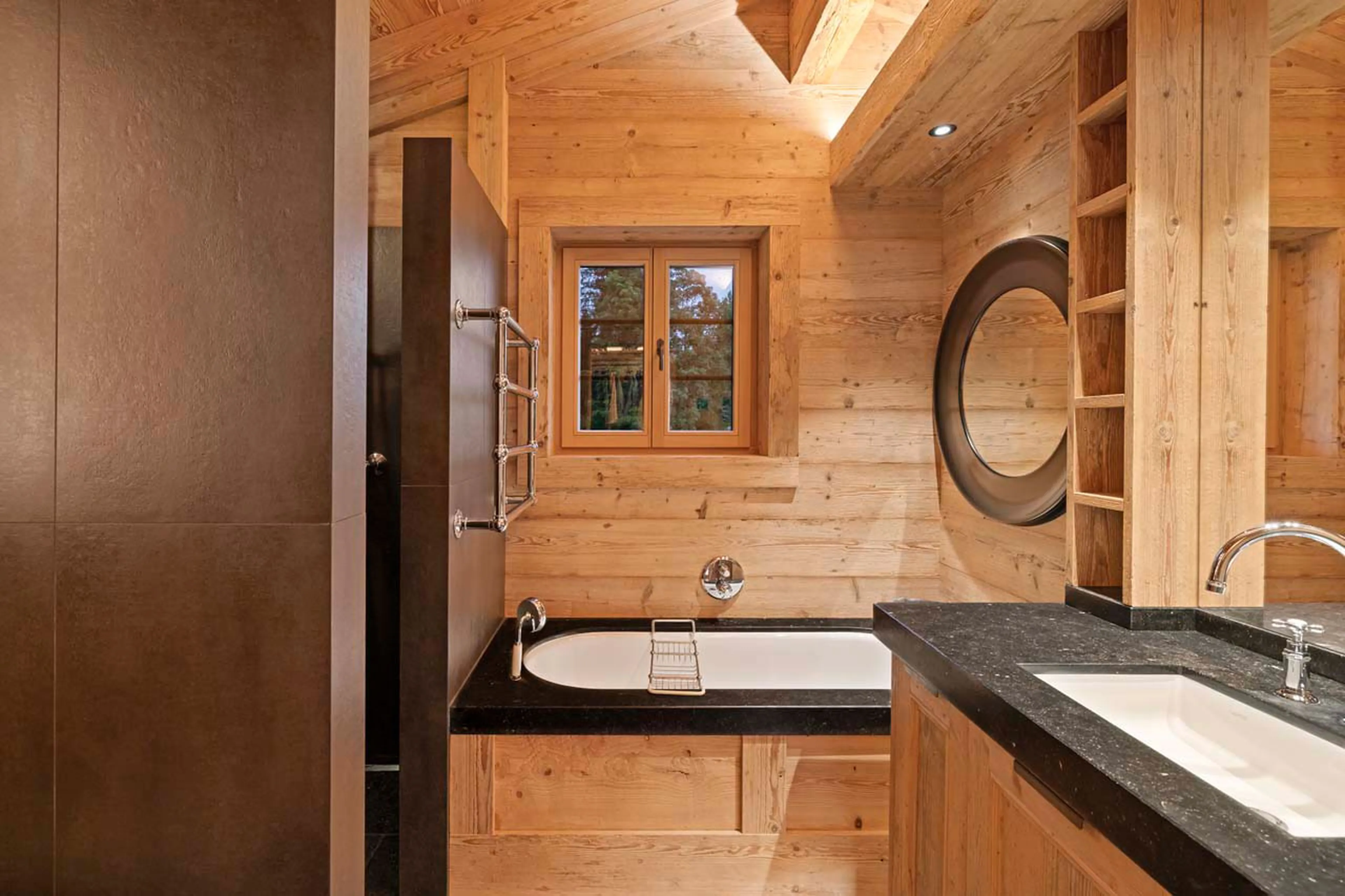 Bathroom one at Chalet Gruben in Gstaad