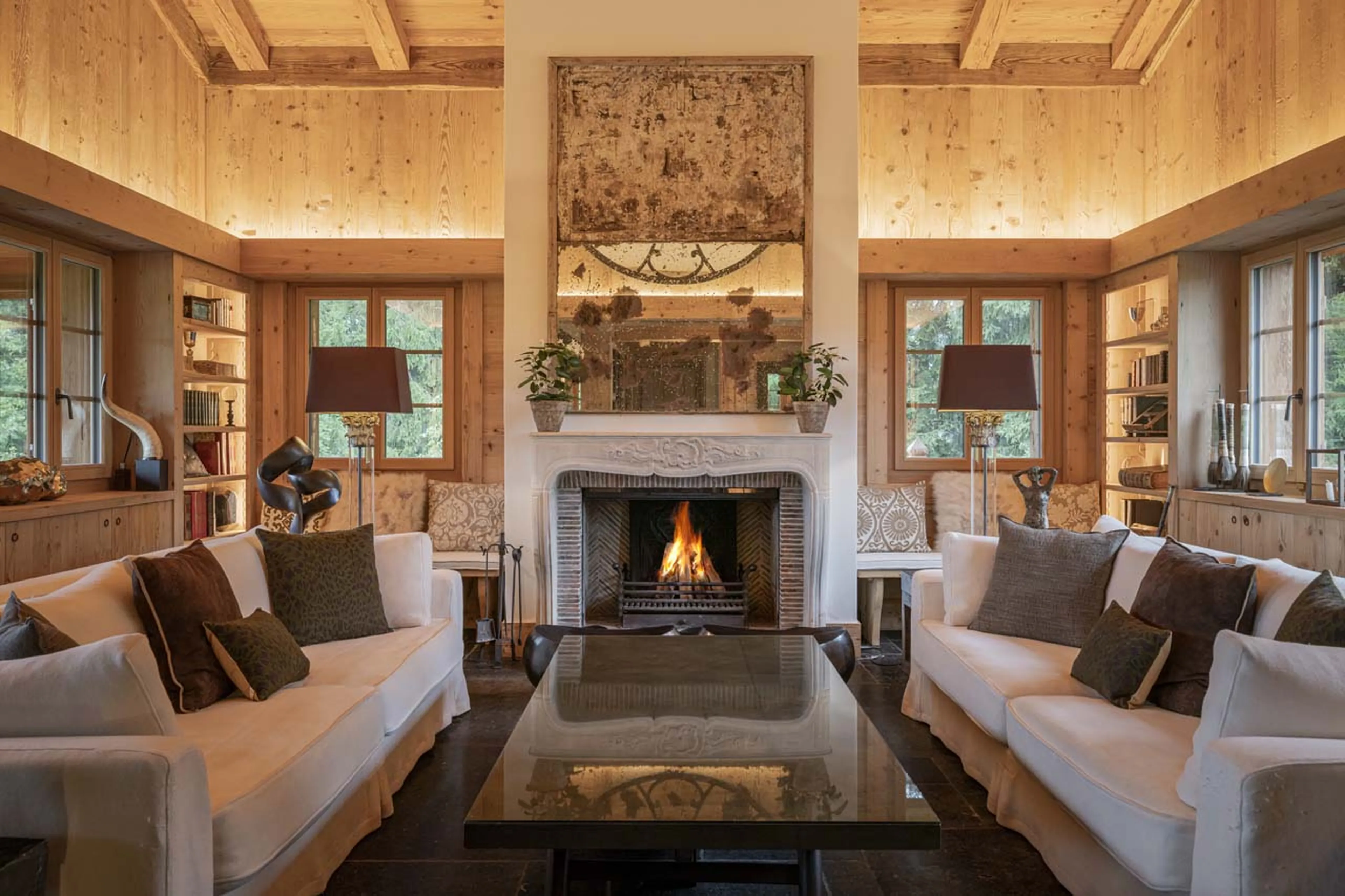 Inviting fireplace at Chalet Gruben in Gstaad