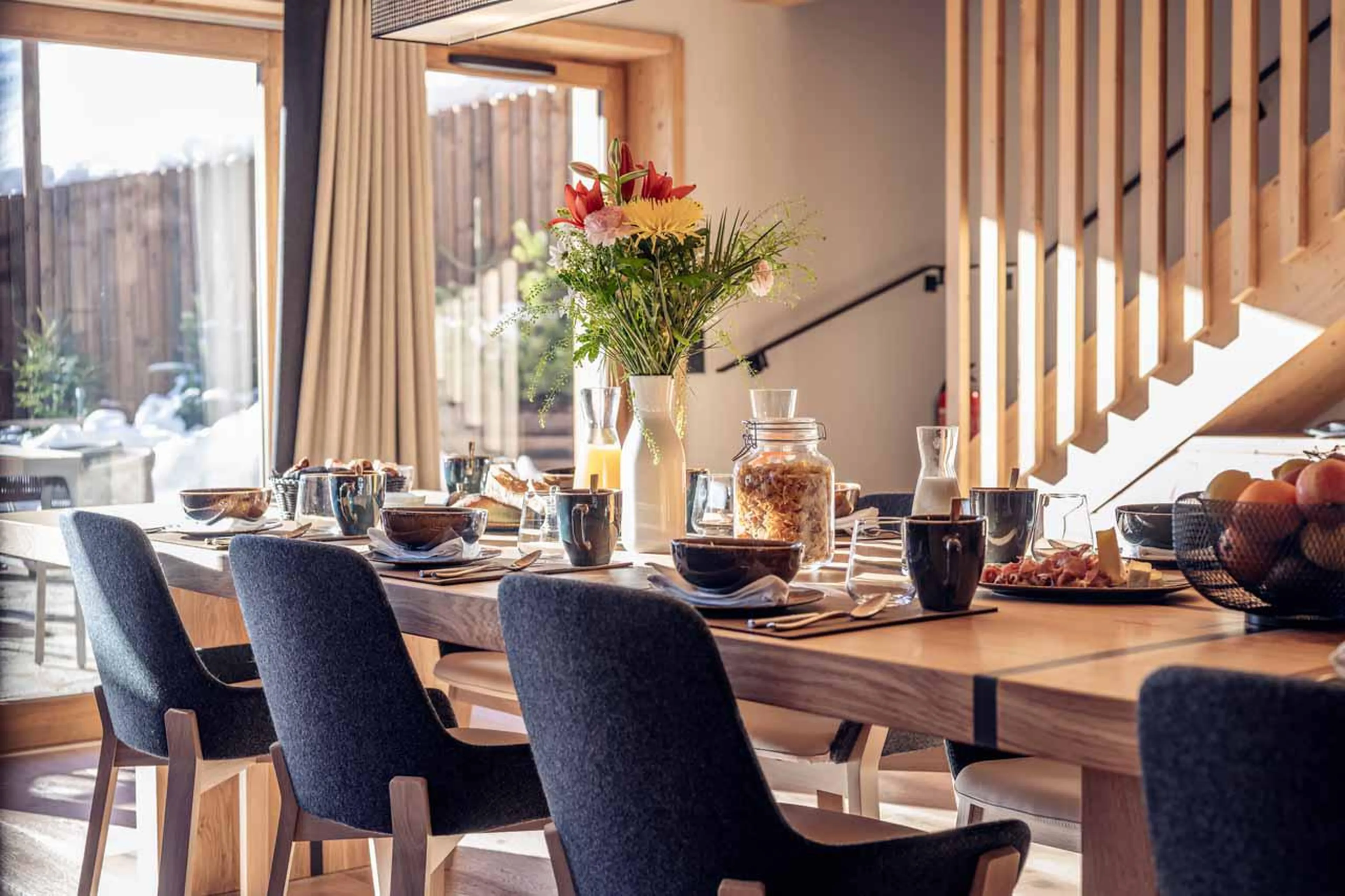 Elegant wooden dining table at Chalet Harmony in Meribel