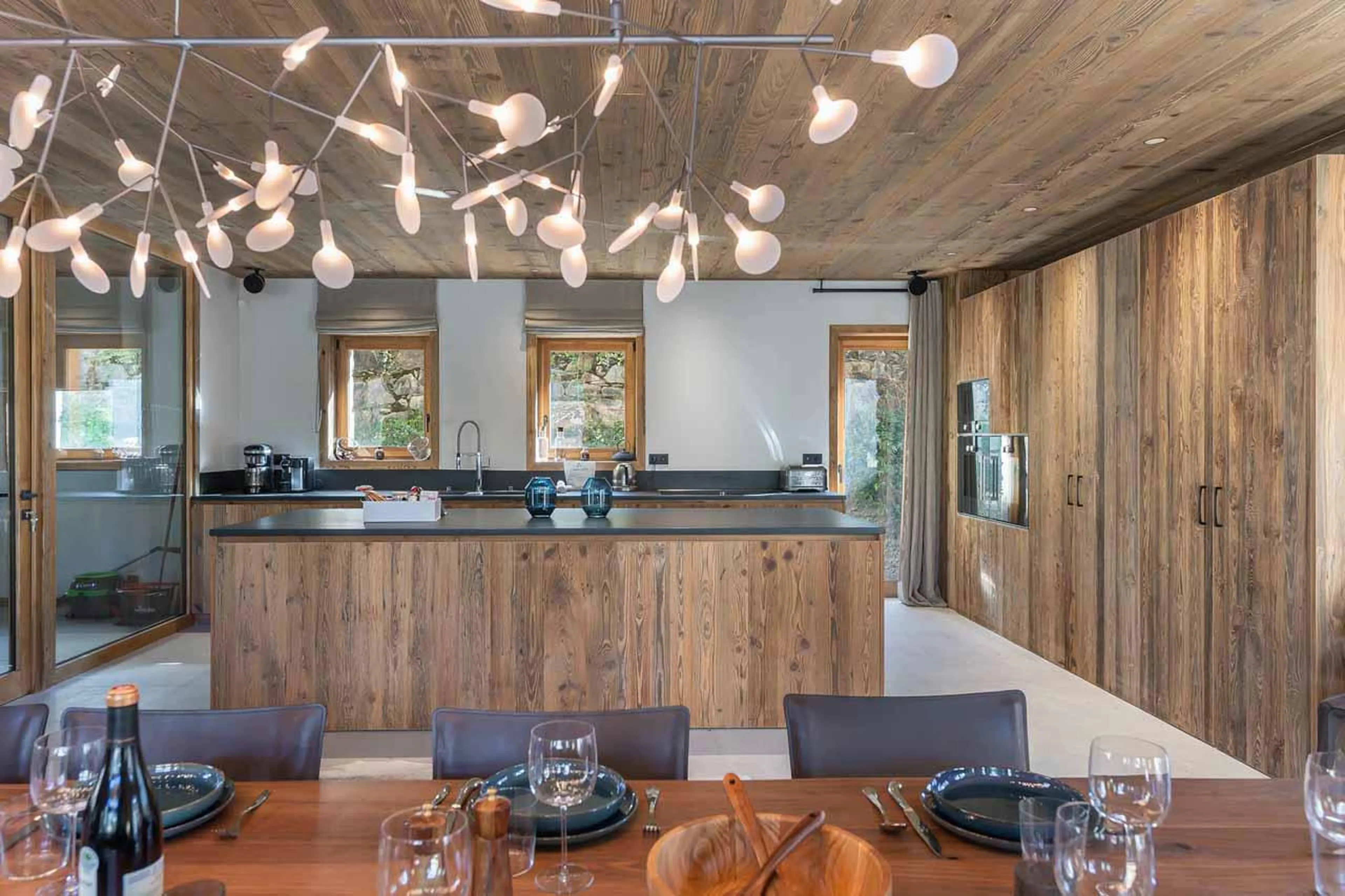 Dining area and kitchen at Chalet Imladris in St Martin de Belleville