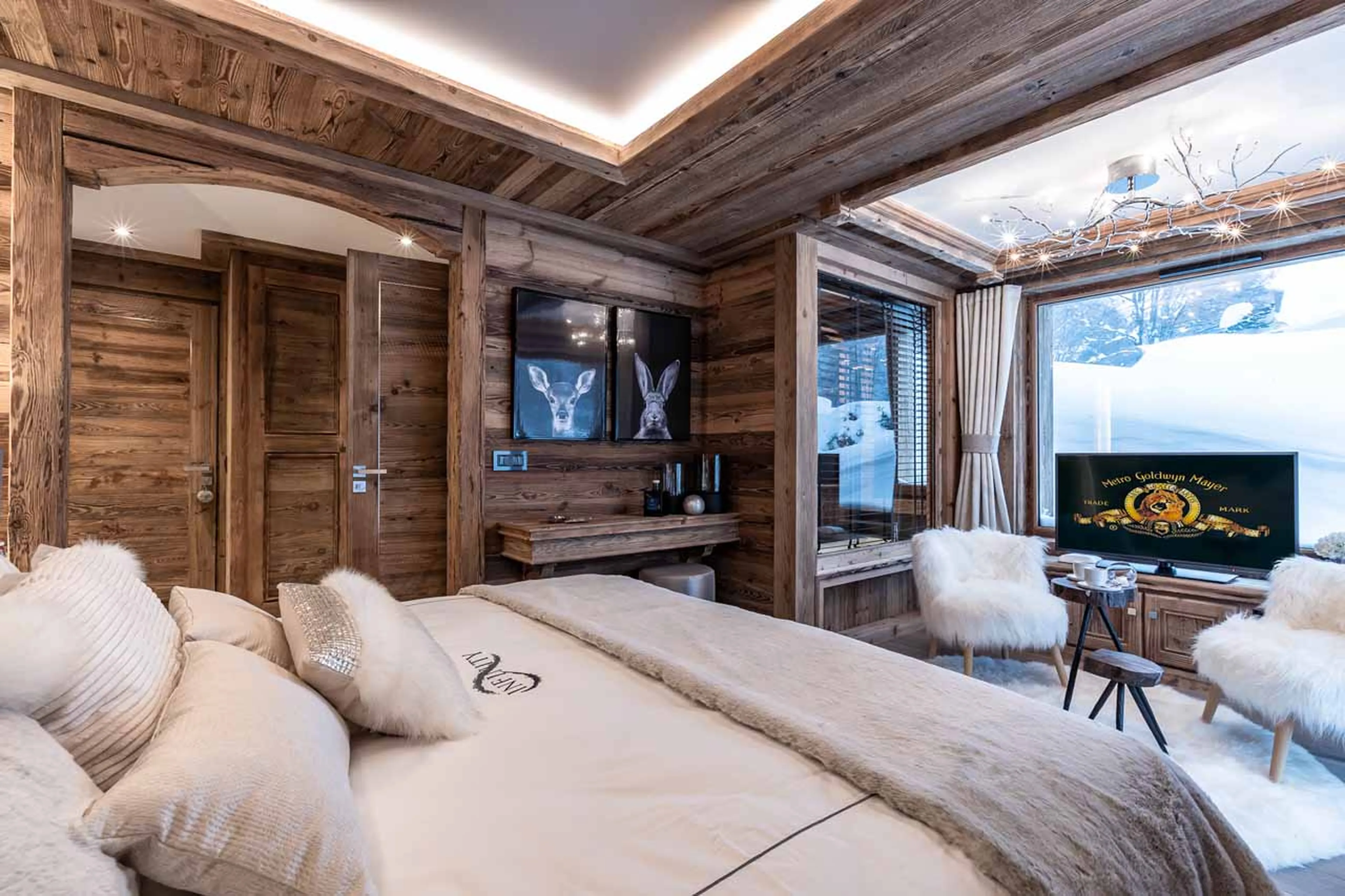 TV in bedroom four at Chalet Infinity in Chamonix