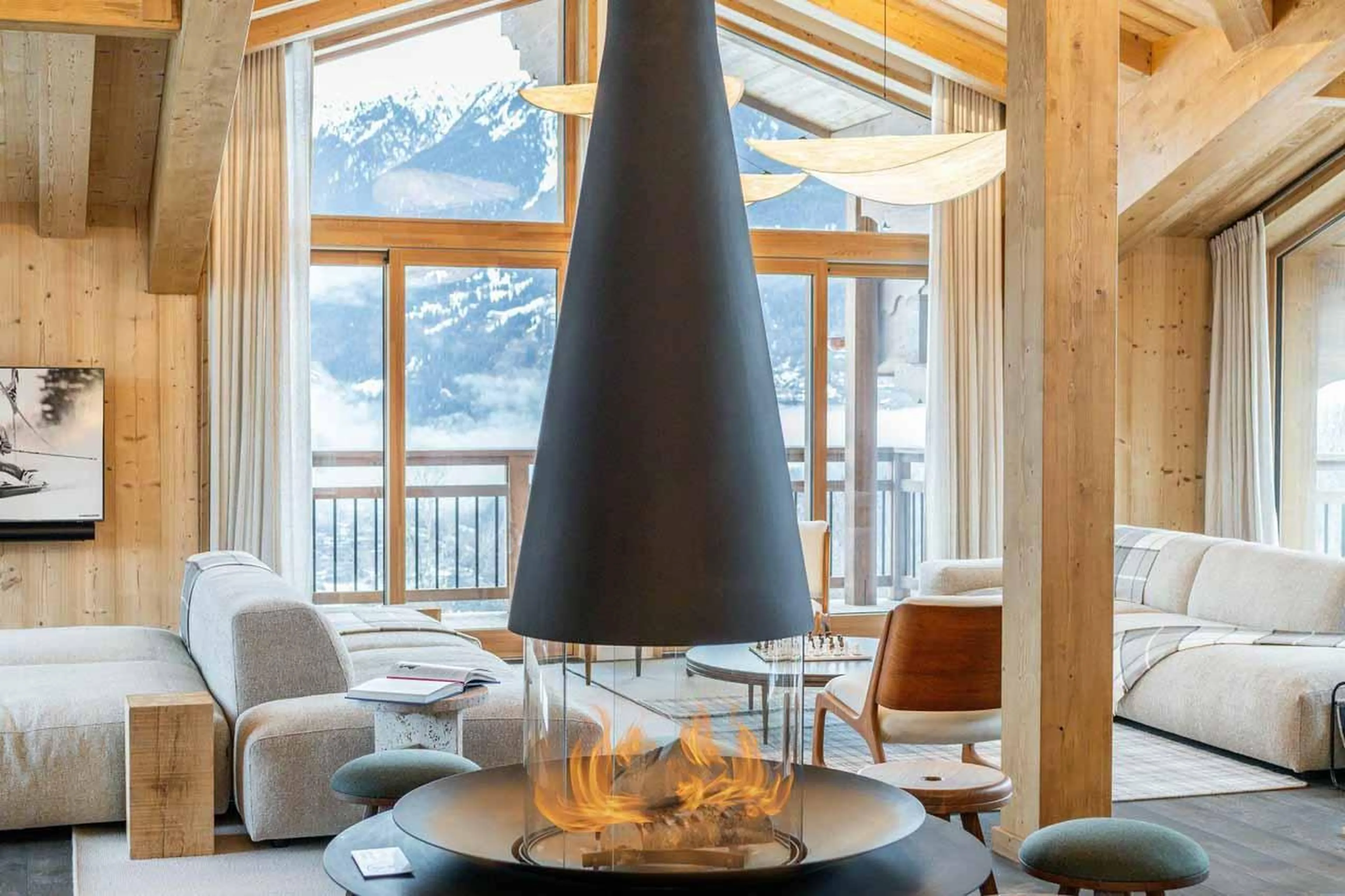 Round central fireplace in Chalet Irbis, Courchevel Le Praz