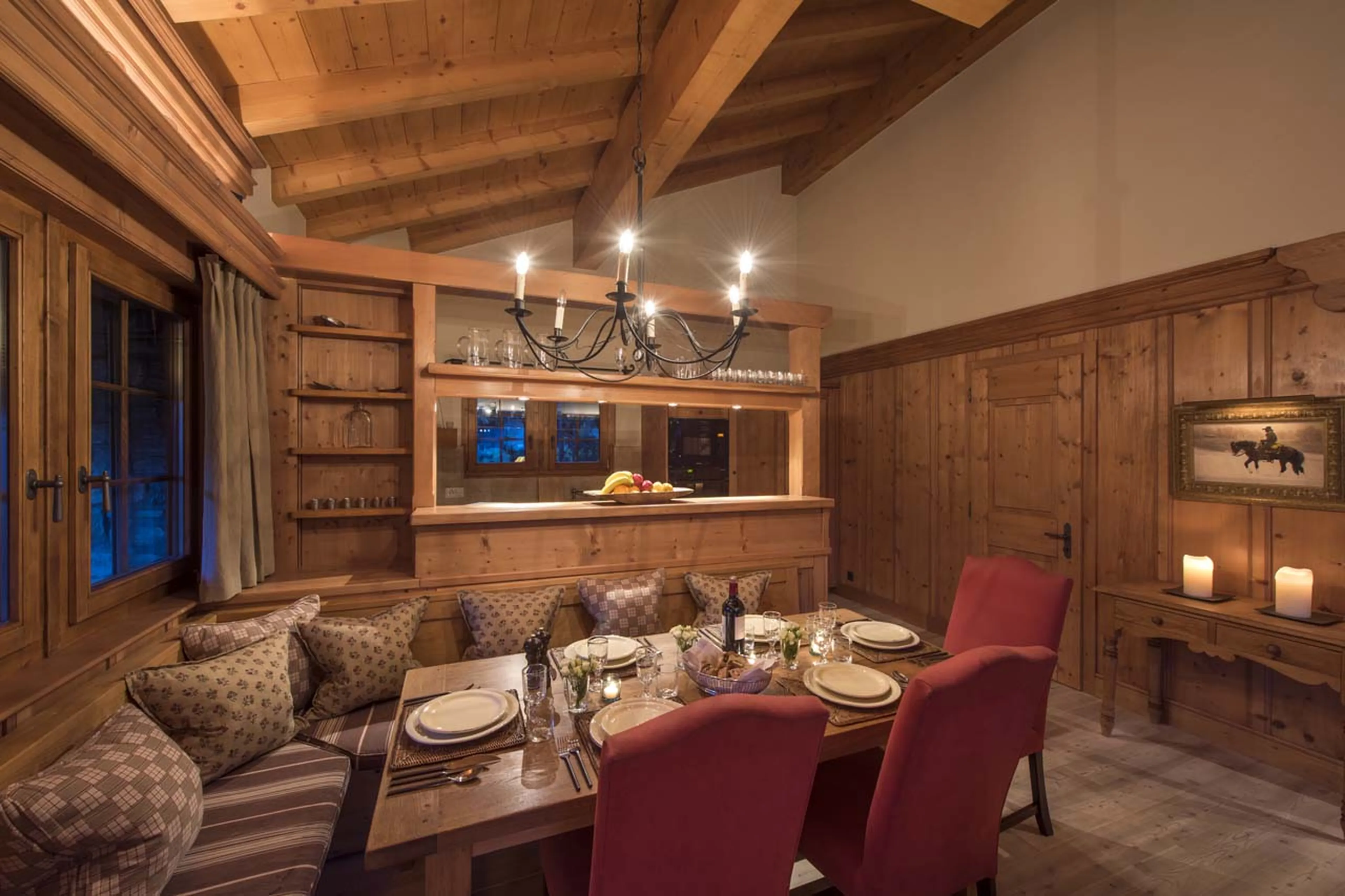 Dining area at night in Chalet Ivouette in Verbier