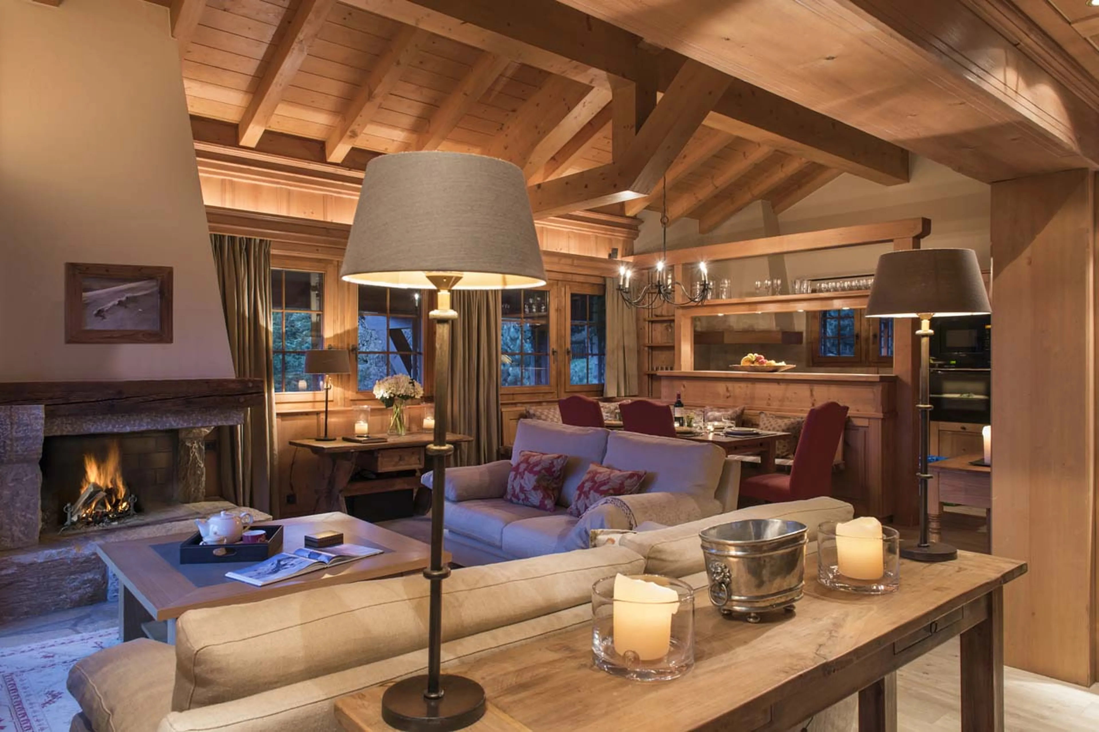 Open fireplace in living area of Chalet Ivouette in Verbier