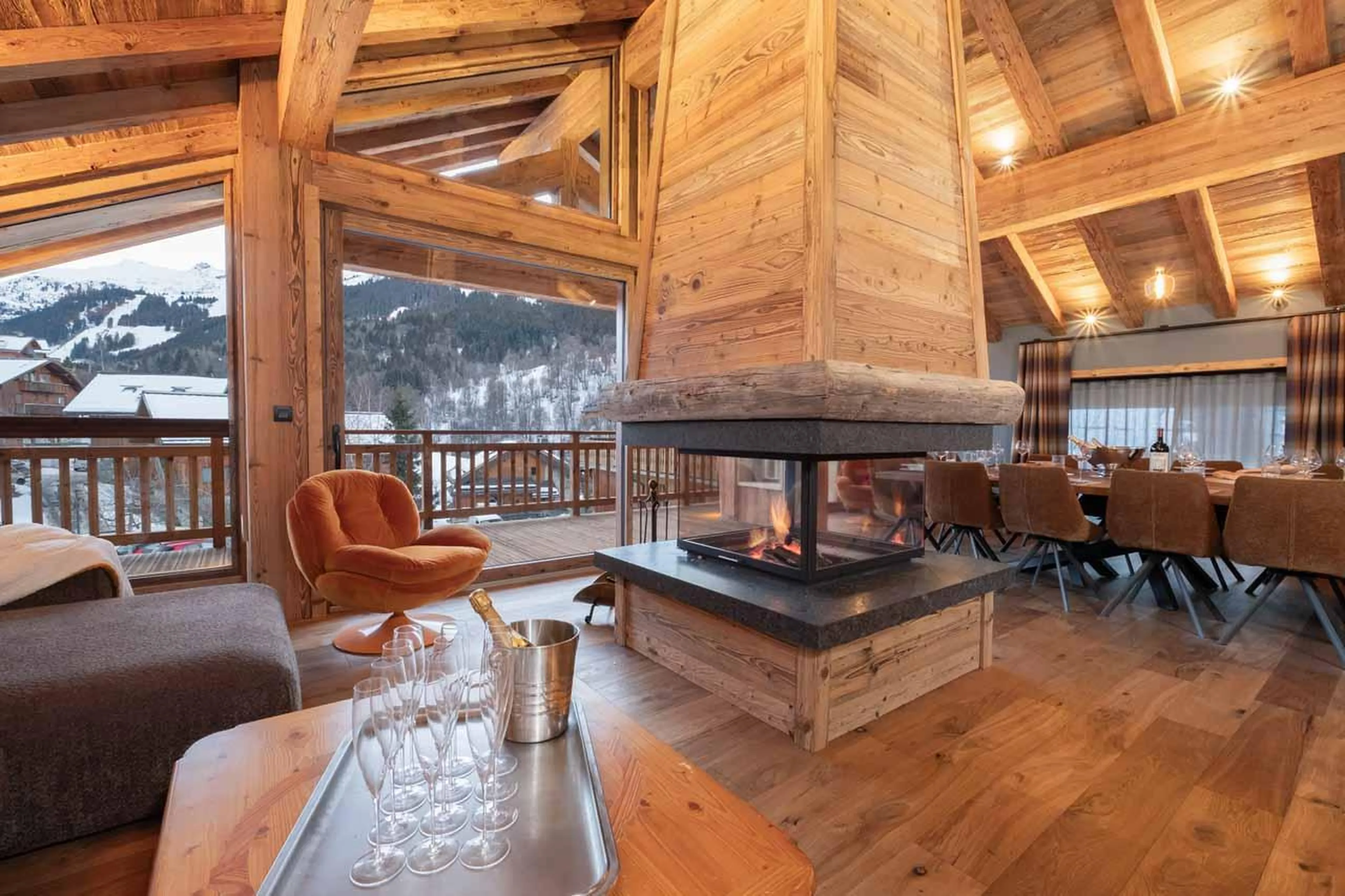 Sitting area with fireplace in Chalet Kalinka, Meribel