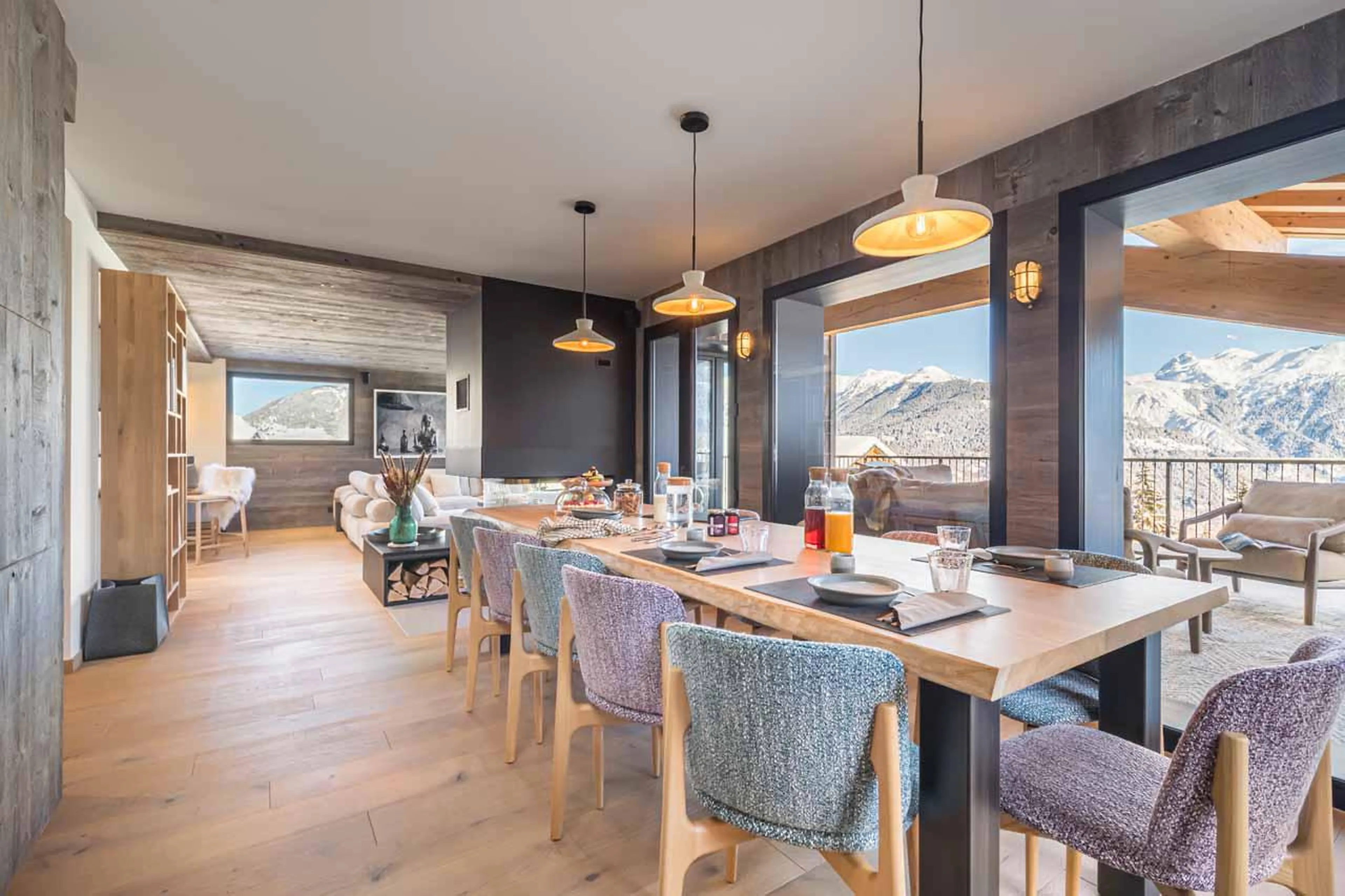 Spacious dining table accommodating up to 12 guests at Chalet Kandahar in Courchevel 1550