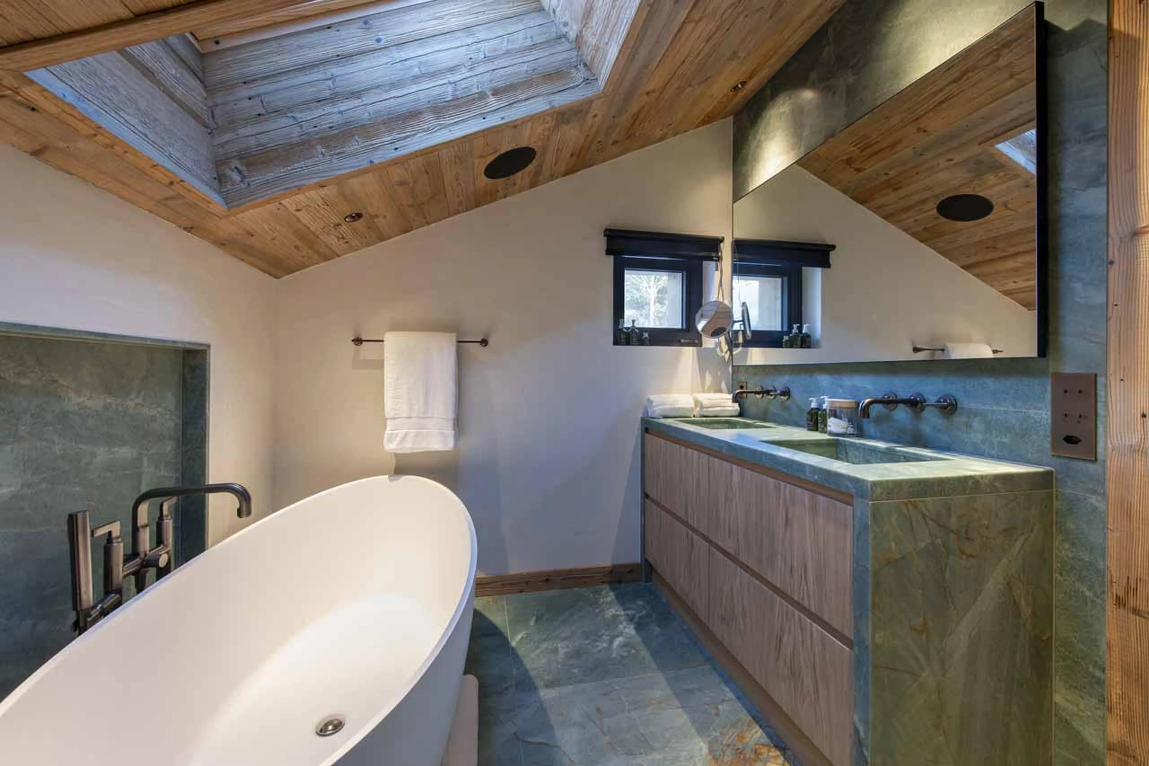 Bathroom with freestanding bath in Chalet Kitsilano, Verbier
