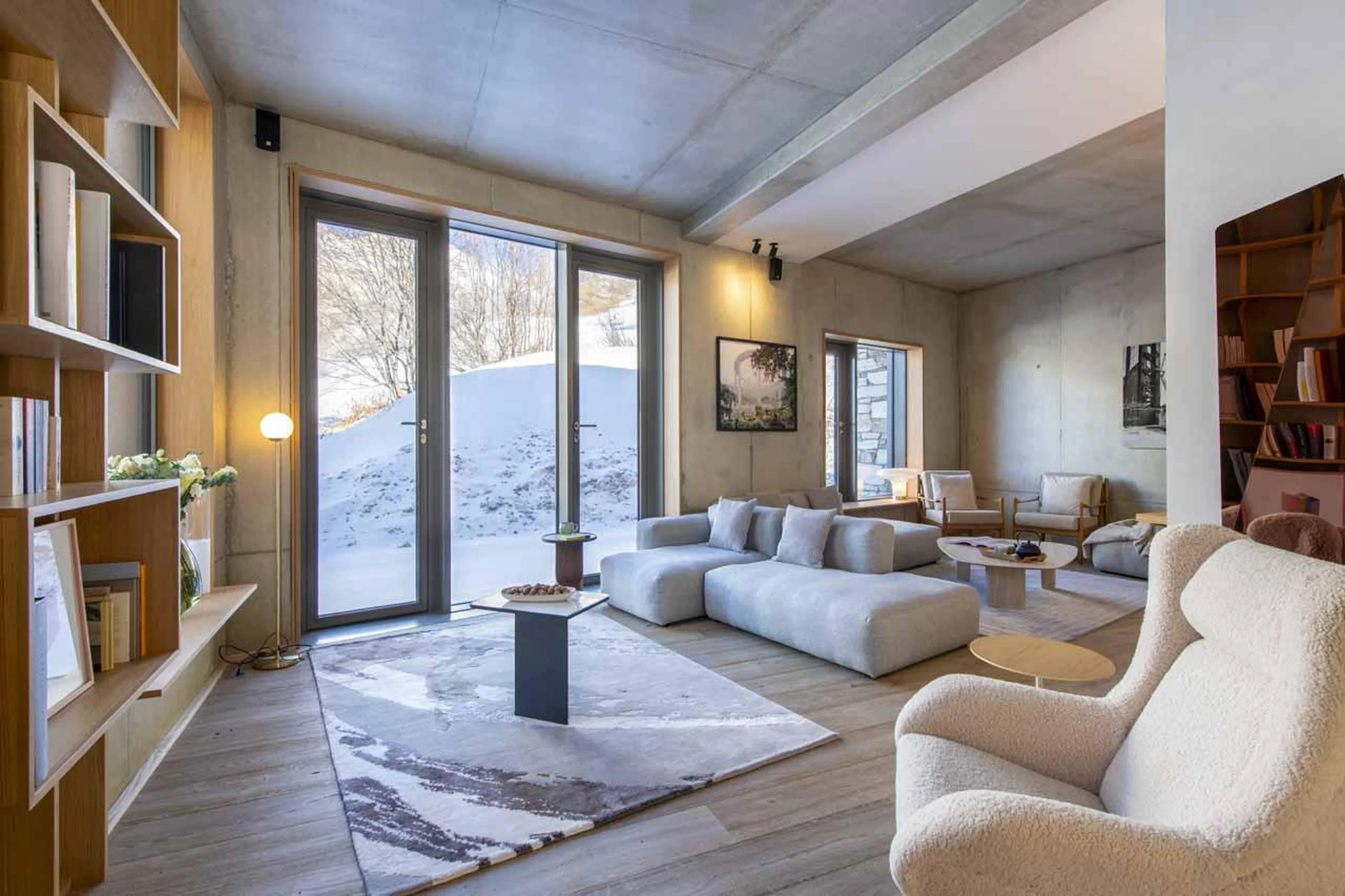 Large doors seamlessly blending the indoor and outdoor spaces at Chalet Kitsune in Val d'Isere