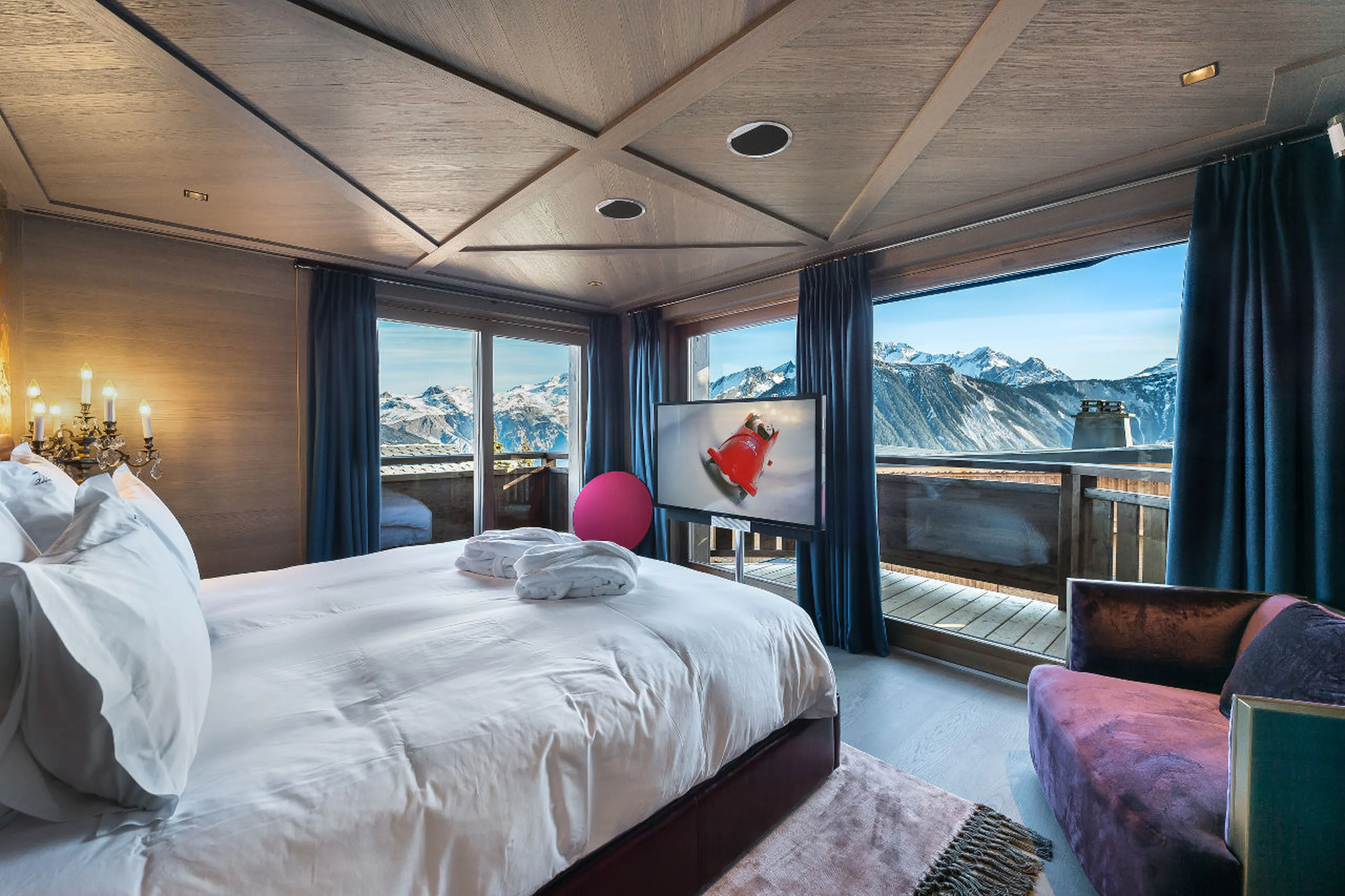 Master bedroom of La Datcha with a view on the mountains of Courchevel 1850