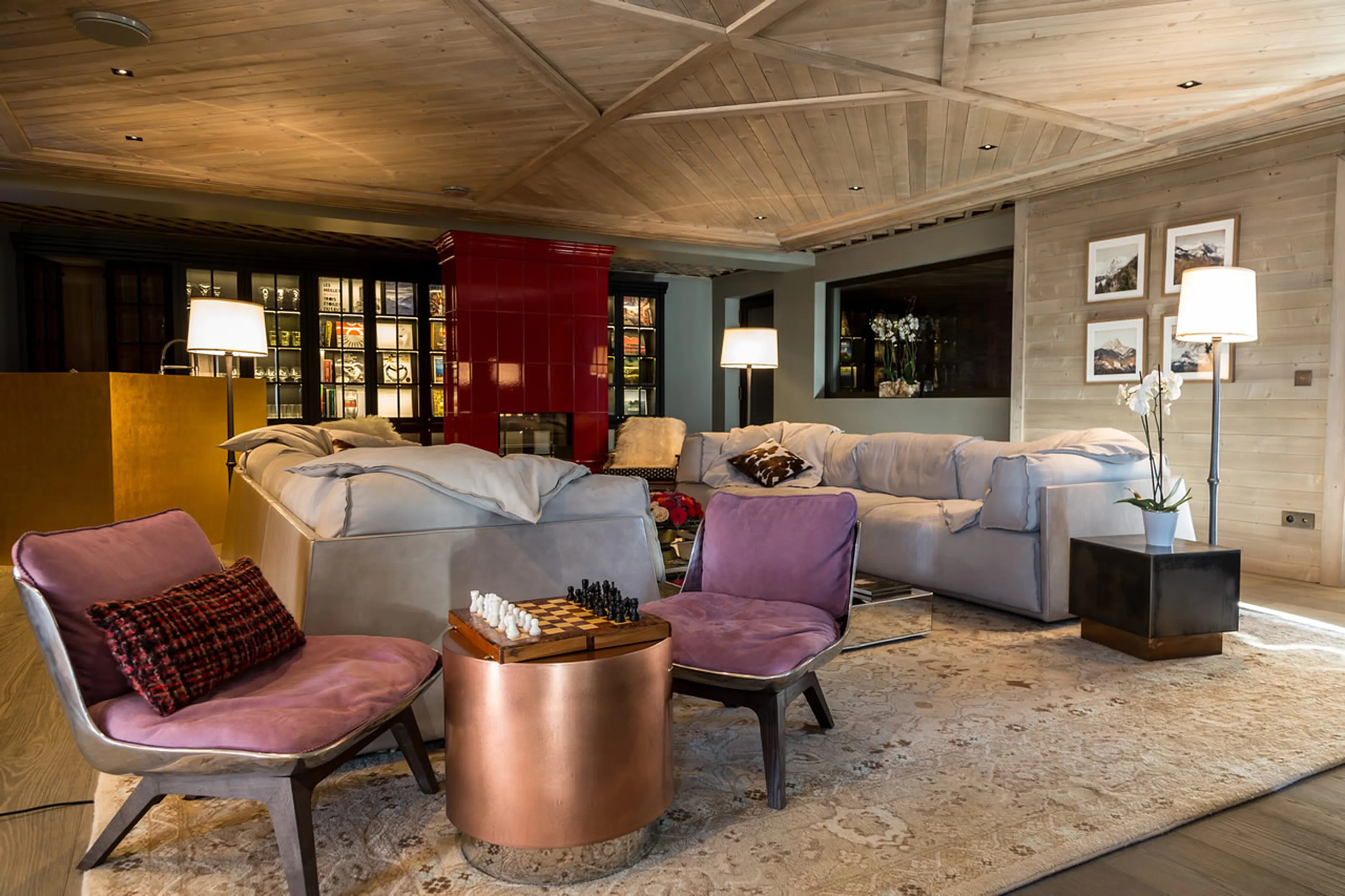 Play a game of chess in modern living room with terrace access of Chalet La Datcha in Val Thorens