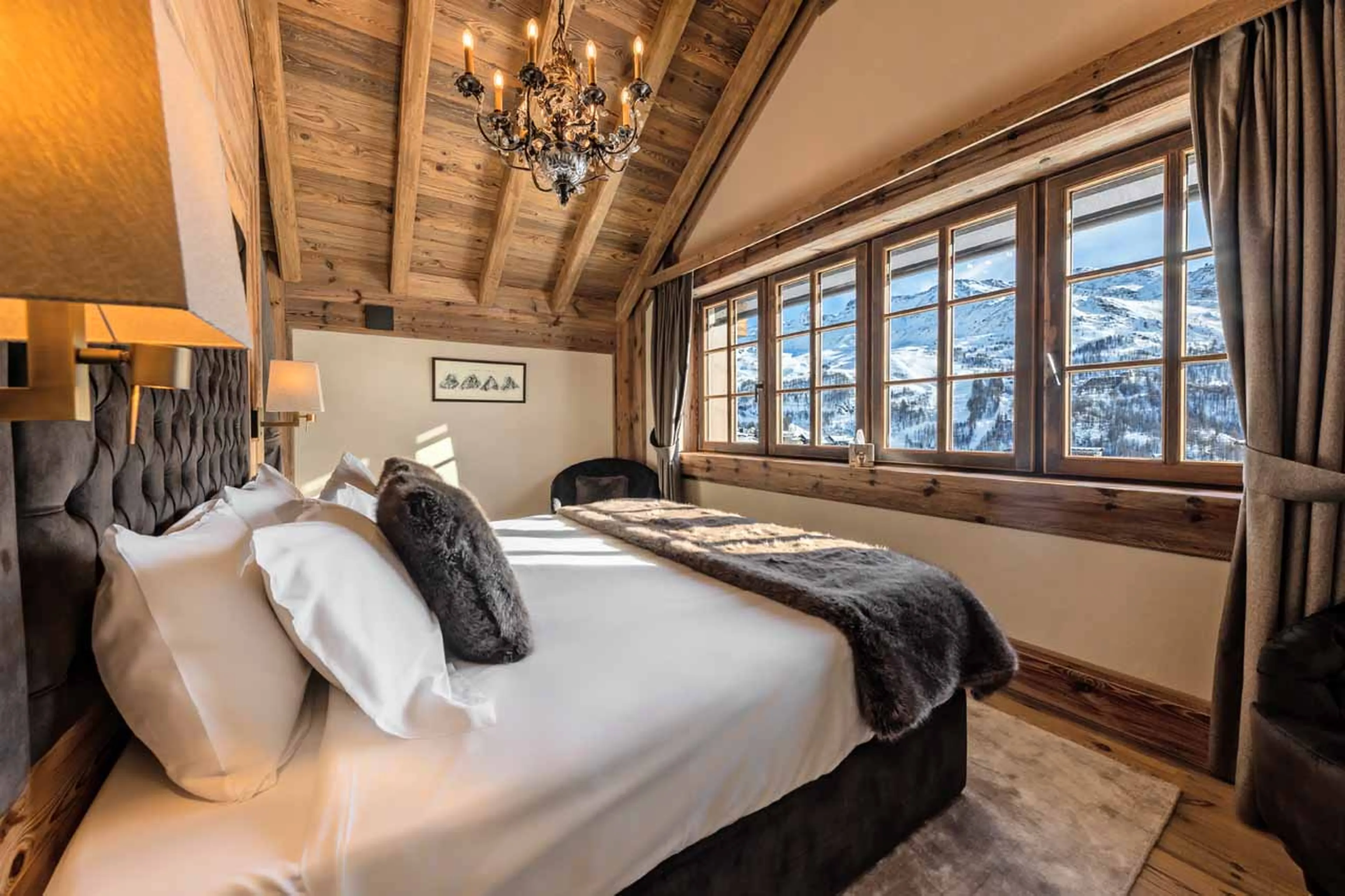 Mountain view from bed at Chalet La Fenice in Breuil-Cervinia