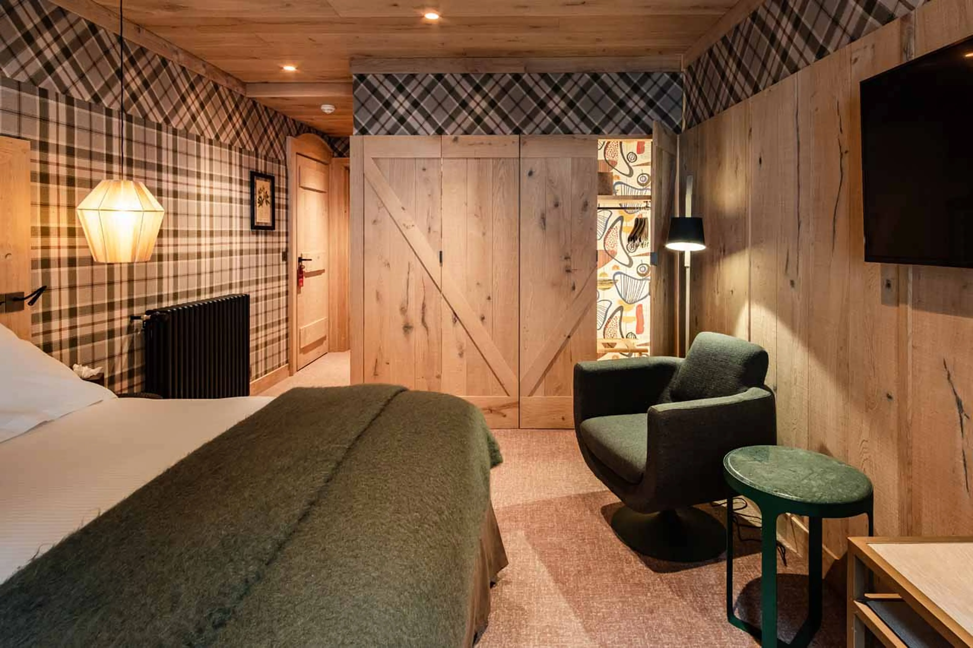 Television in bedroom three at Chalet La Grange in Val d'Isere