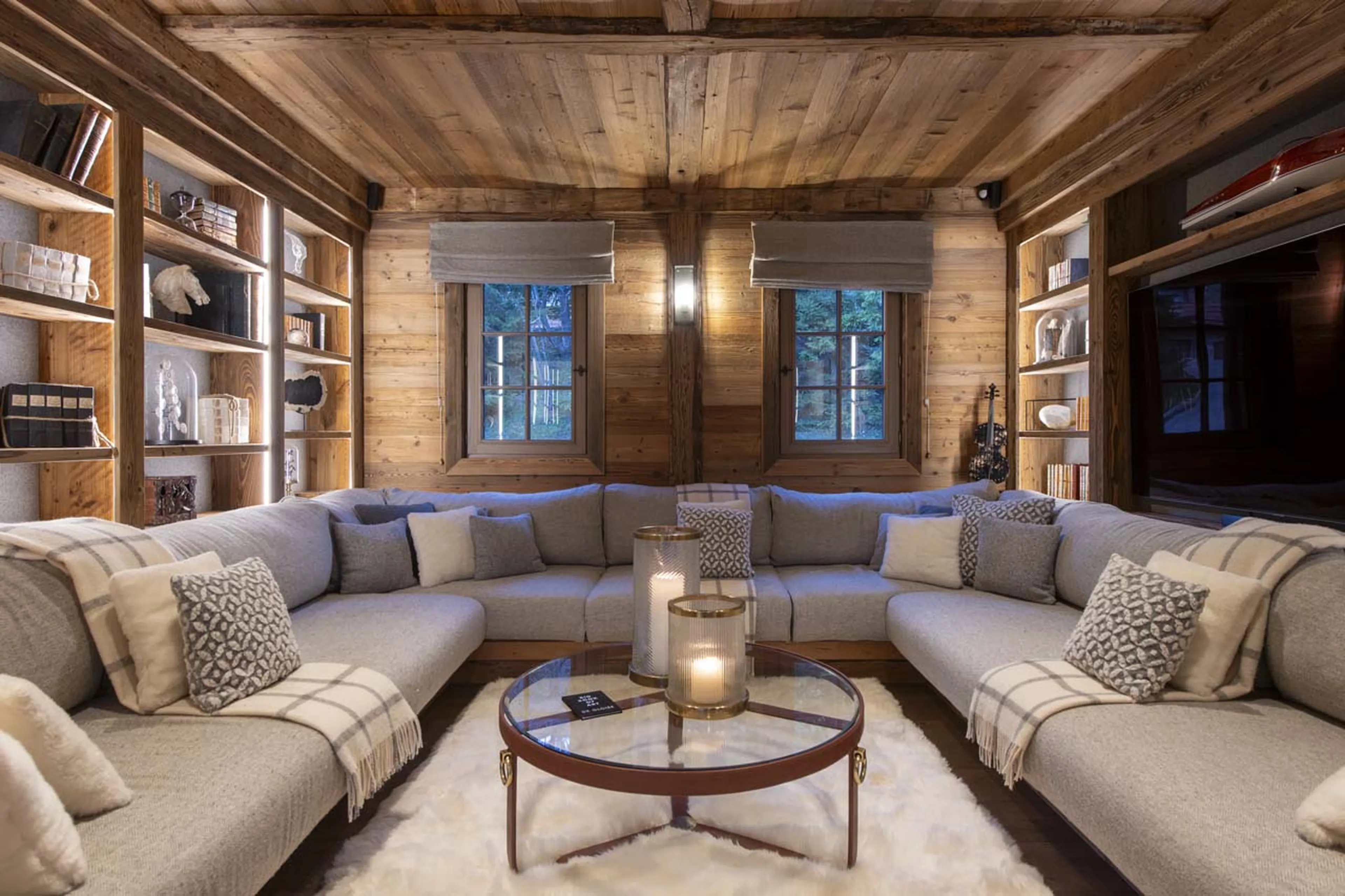 Wrap-around sofa in cinema room in Chalet La Taniere, Meribel
