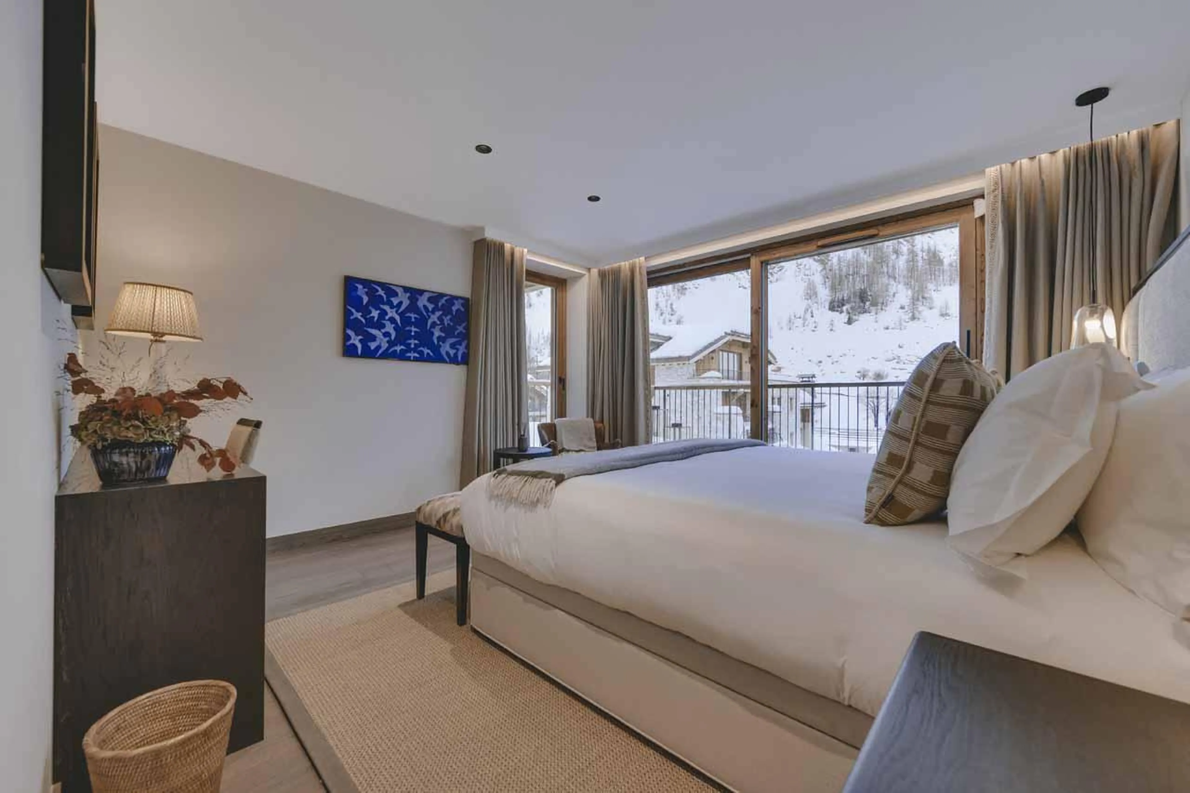 Double bedroom with sliding glass doors at Chalet La Tene, Val d'Isere