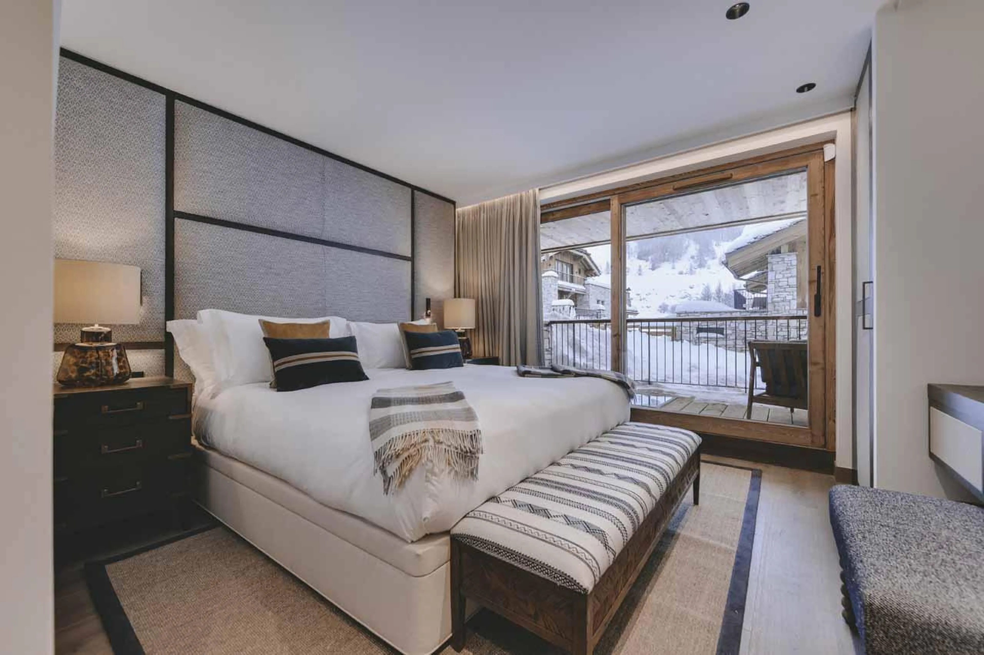Double bedroom with sliding glass doors at Chalet La Tene, Val d'Isere