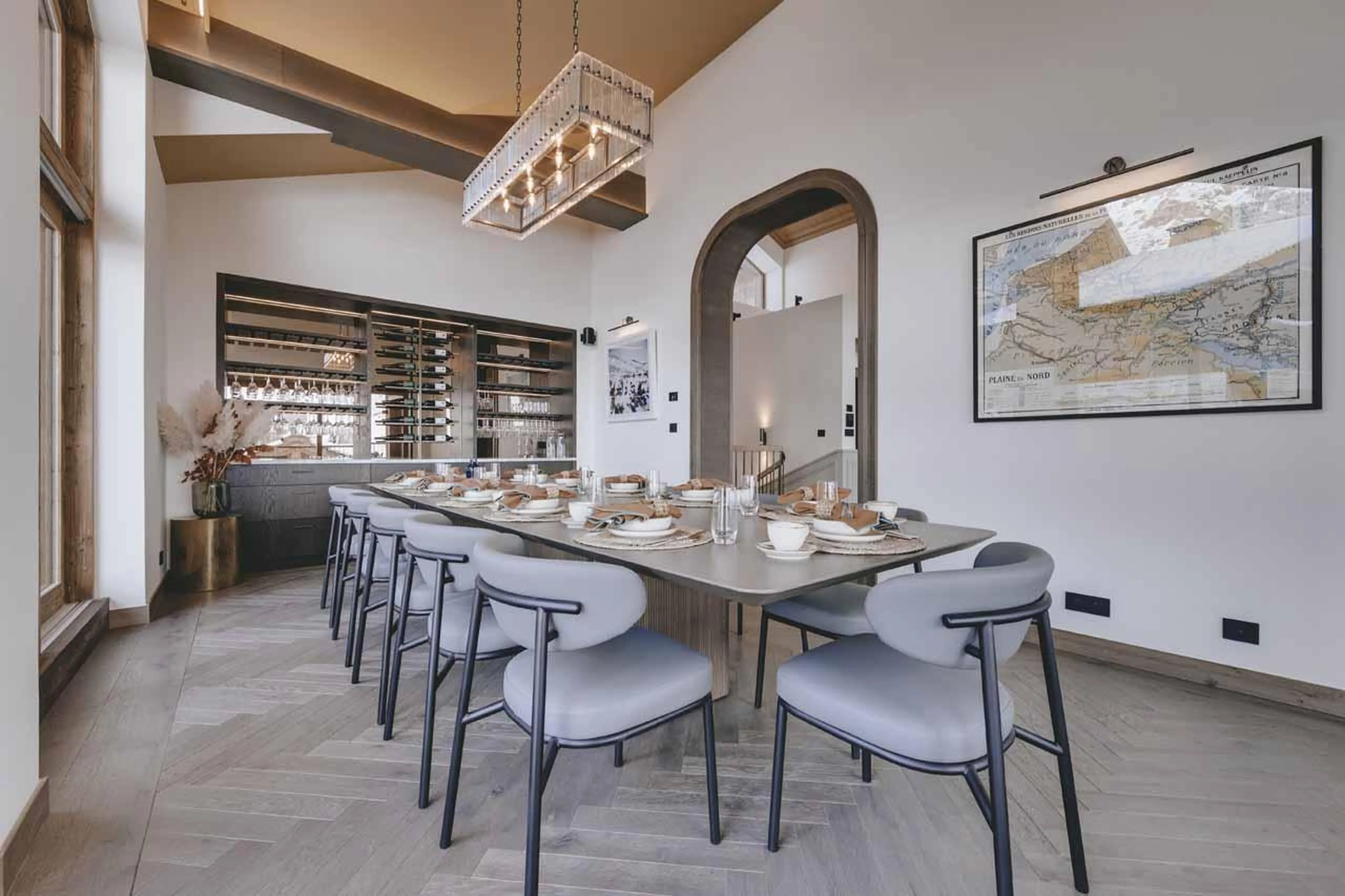 Dining room with wine on display at Chalet La Tene, Val d'Isere