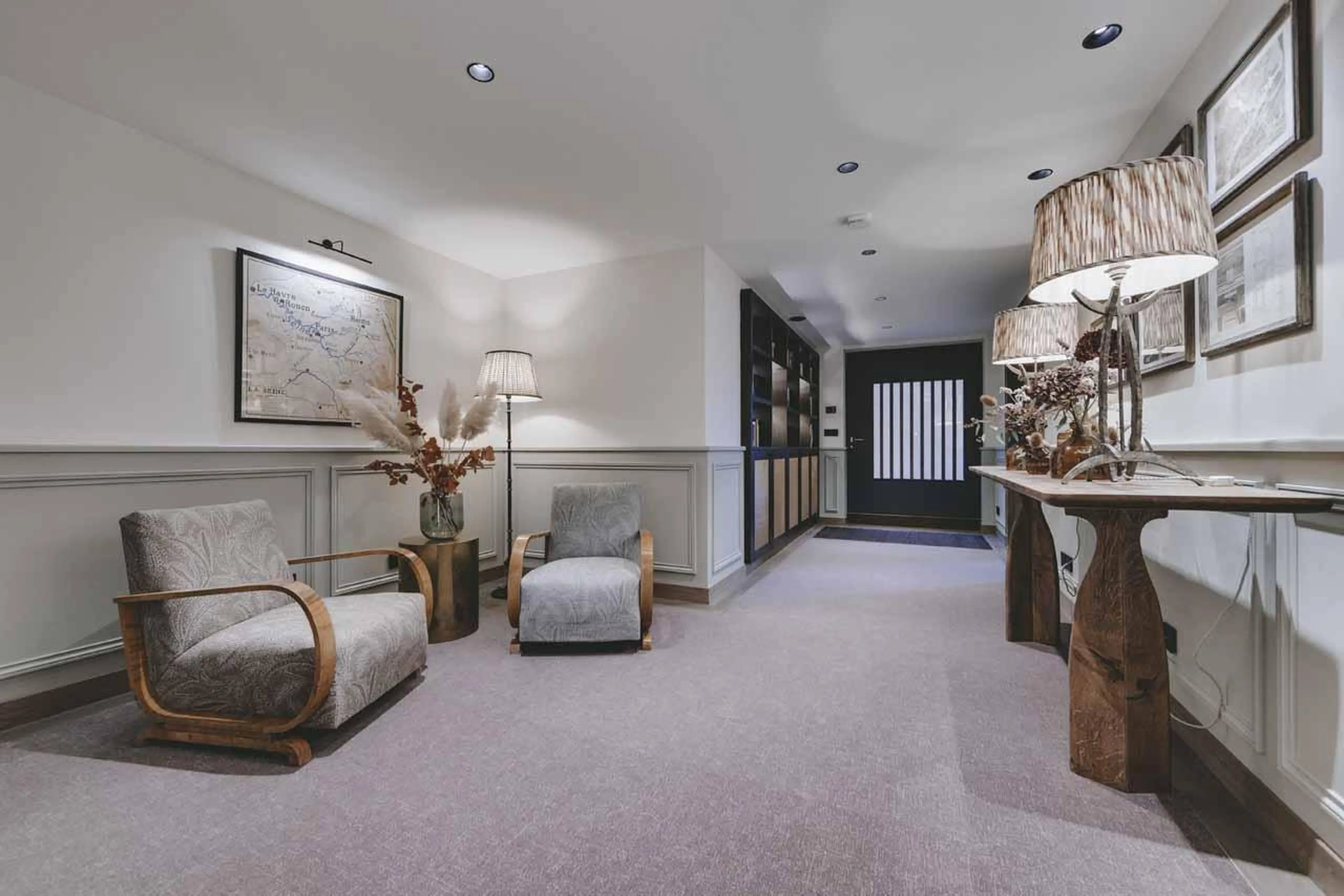 Entrance hall with sitting area and front door at Chalet La Tene, Val d'Isere