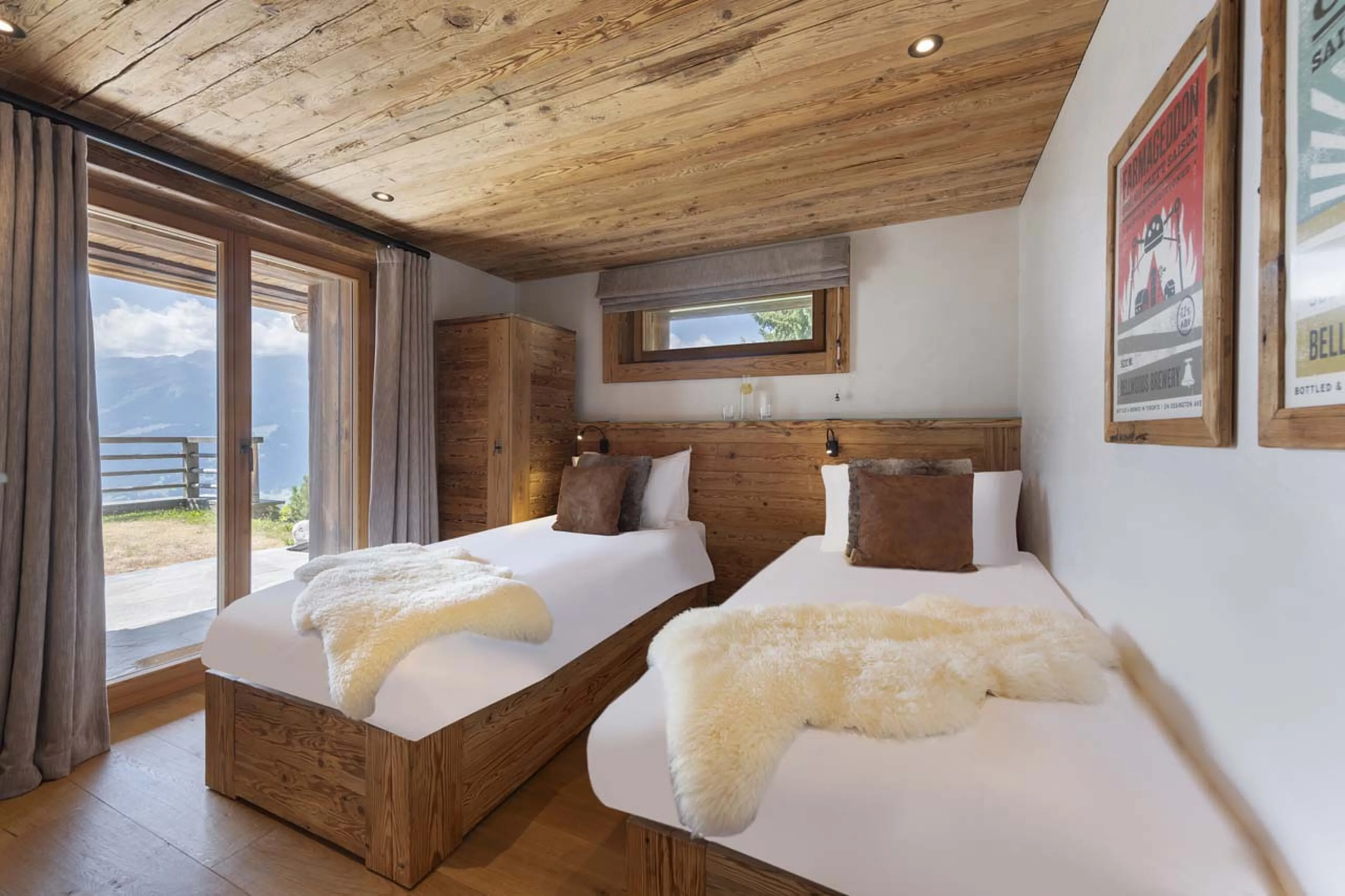 Access to terrace from bedroom three at Chalet La Vigne in Verbier