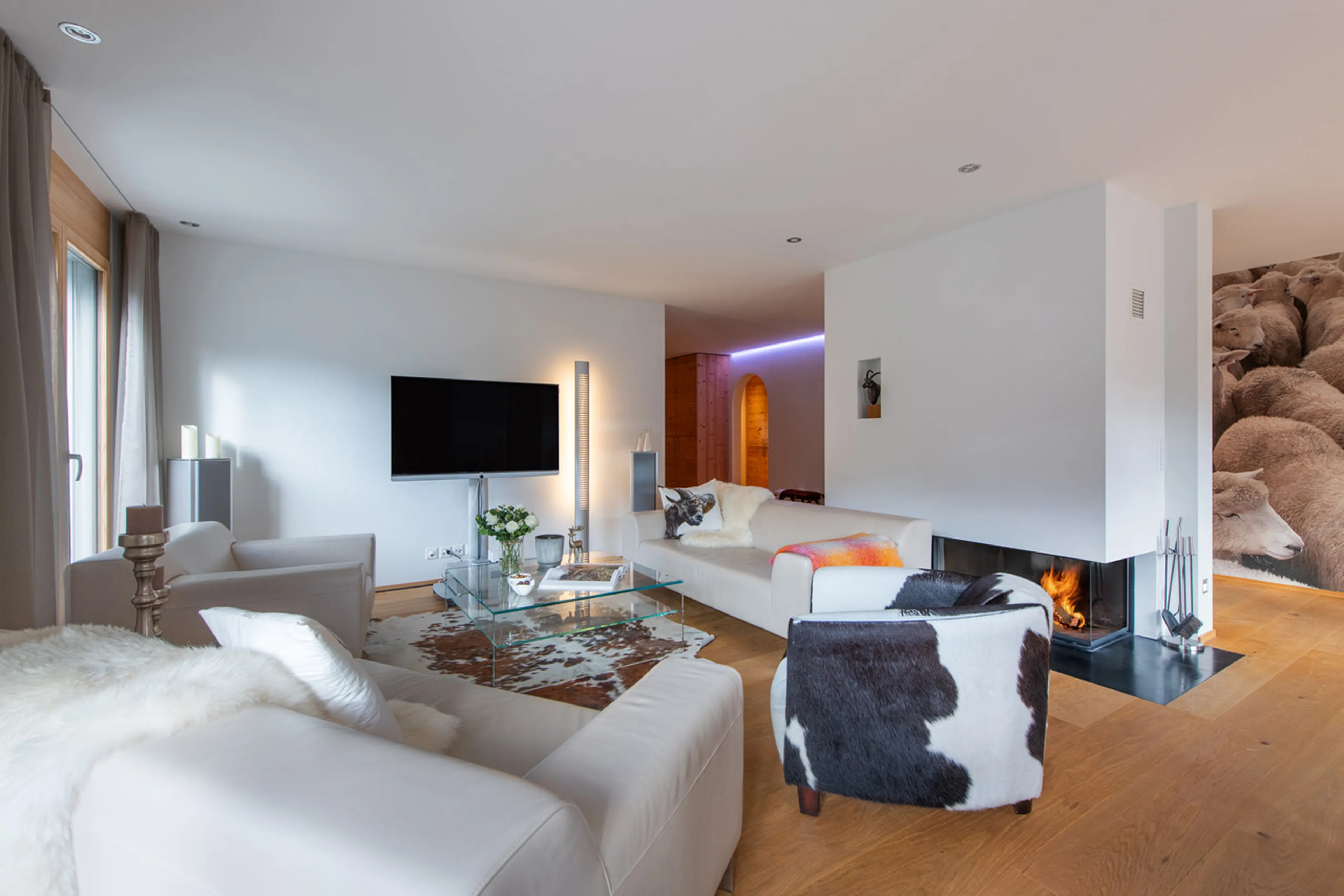 Fireplace in living area at Chalet Larch in Davos