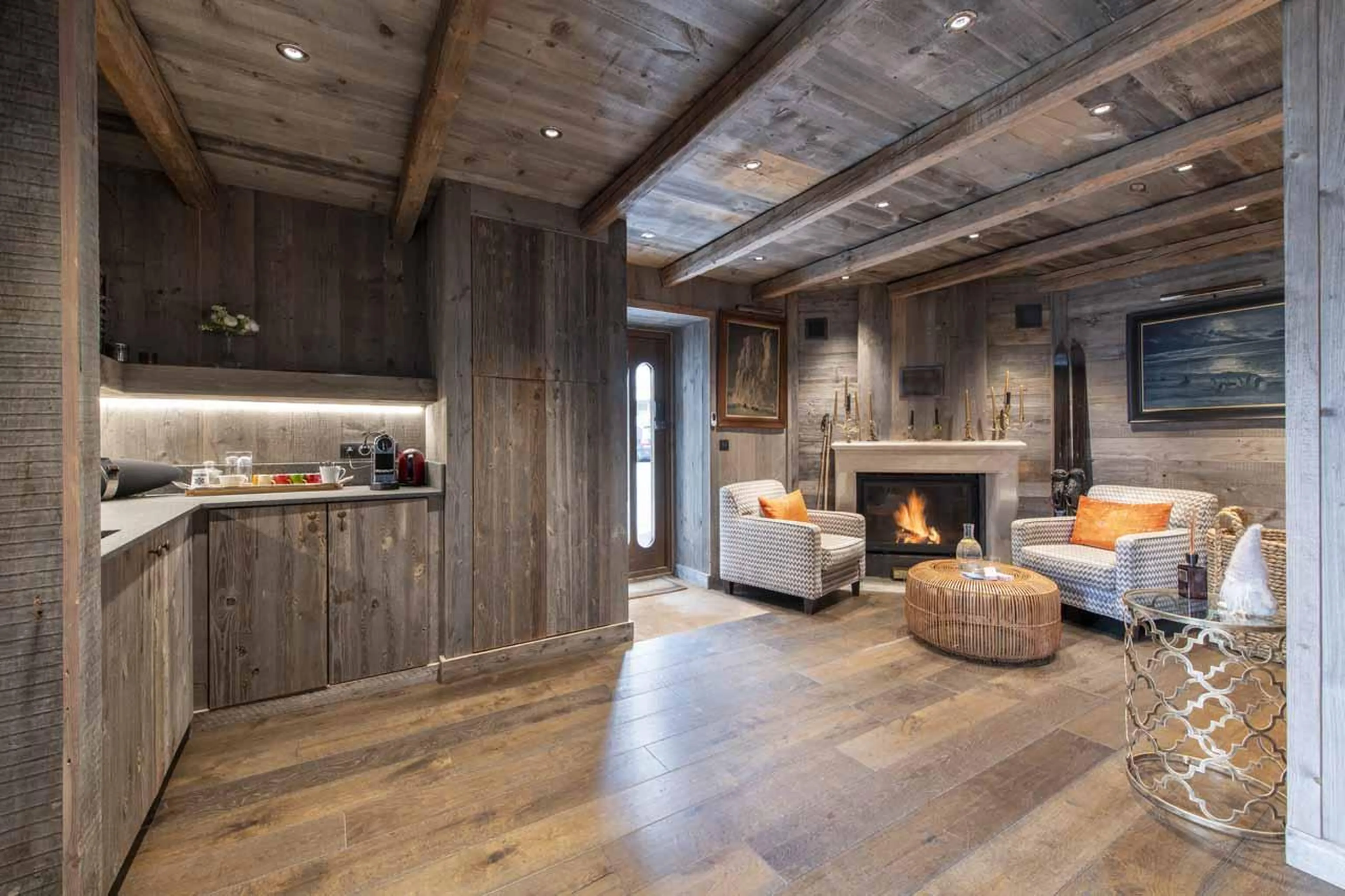 Fireplace in entrance area to Chalet L’Arctique in Courchevel 1850