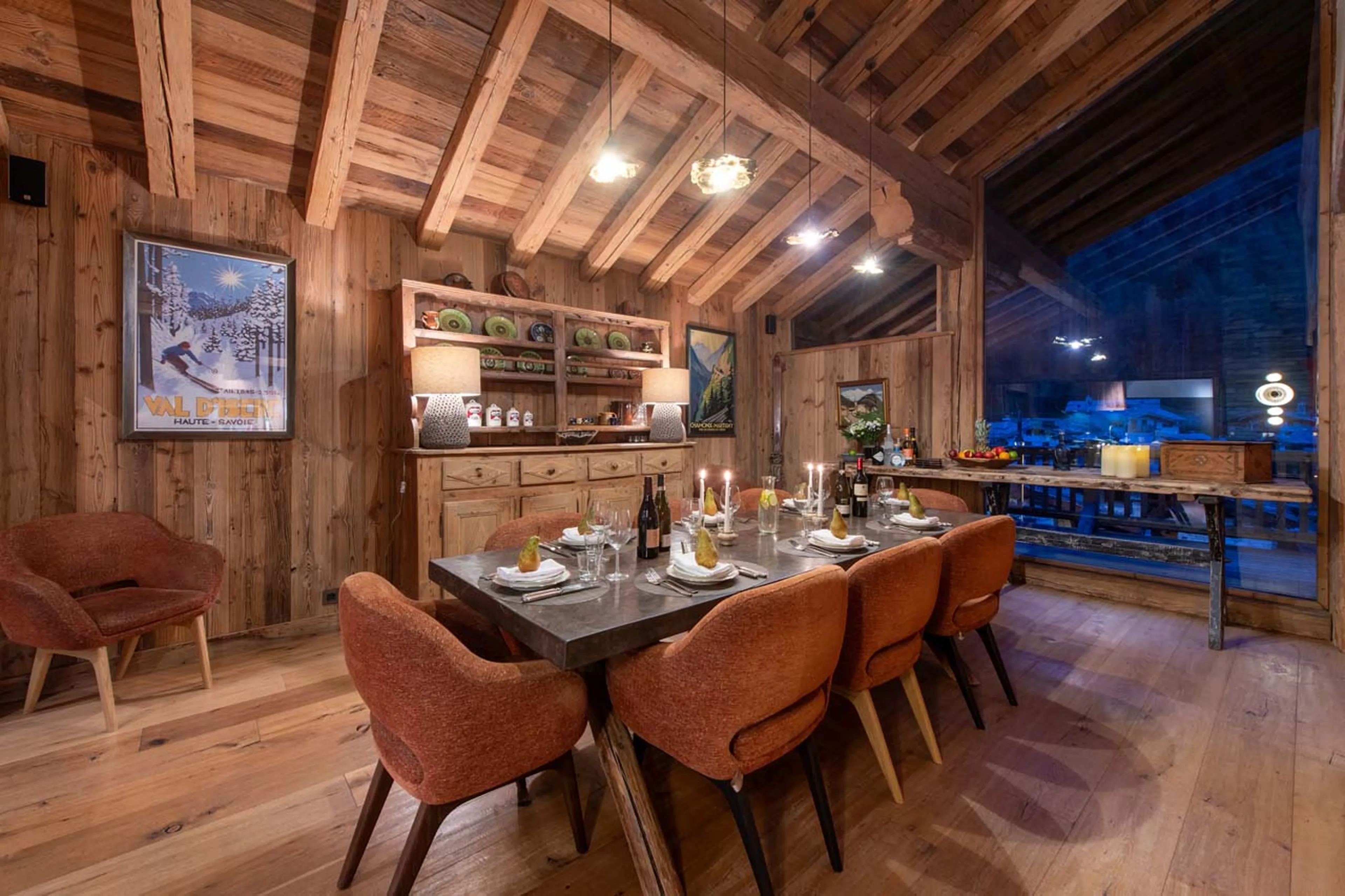 Dining table at night at Chalet Lashca in Val d'Isere