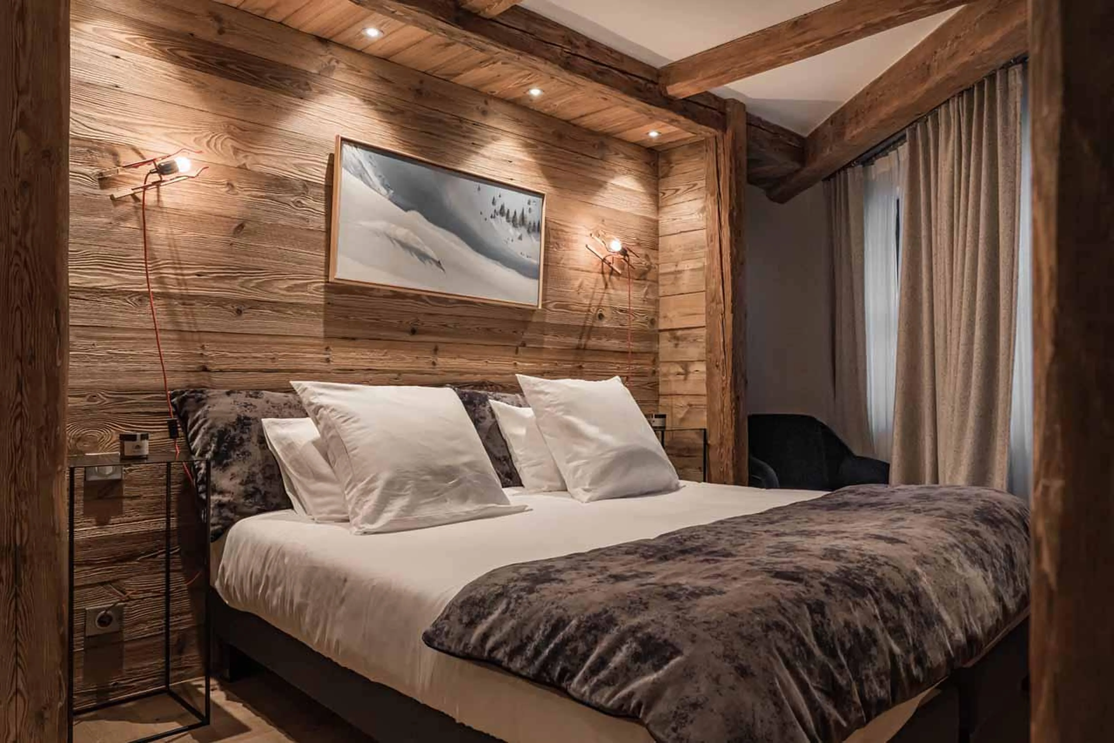 Bedroom one at Chalet Le Papillon in Val d'Isere