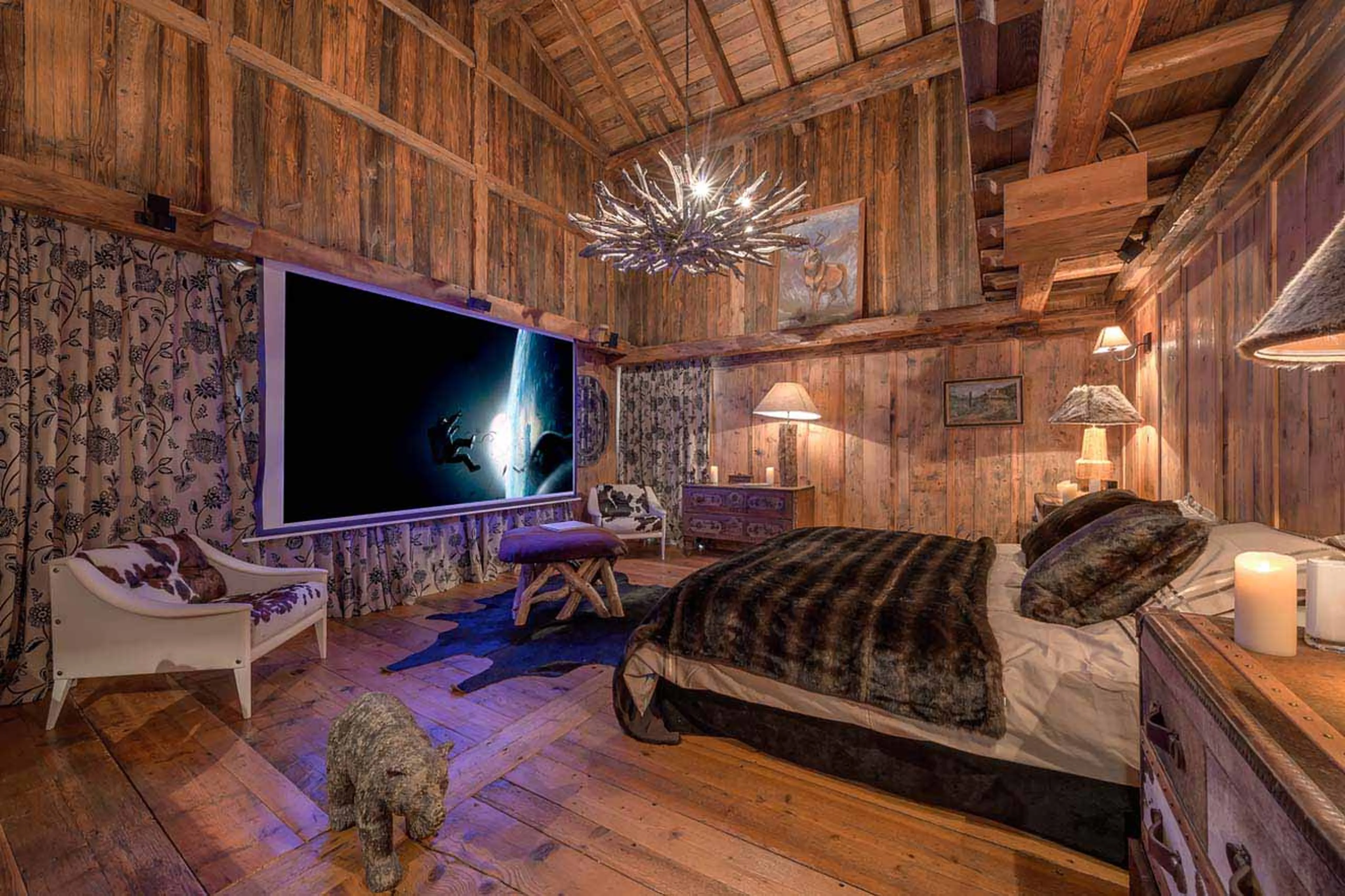 Master bedroom TV at Le Rocher, Hameau Alpin in Val d'Isere