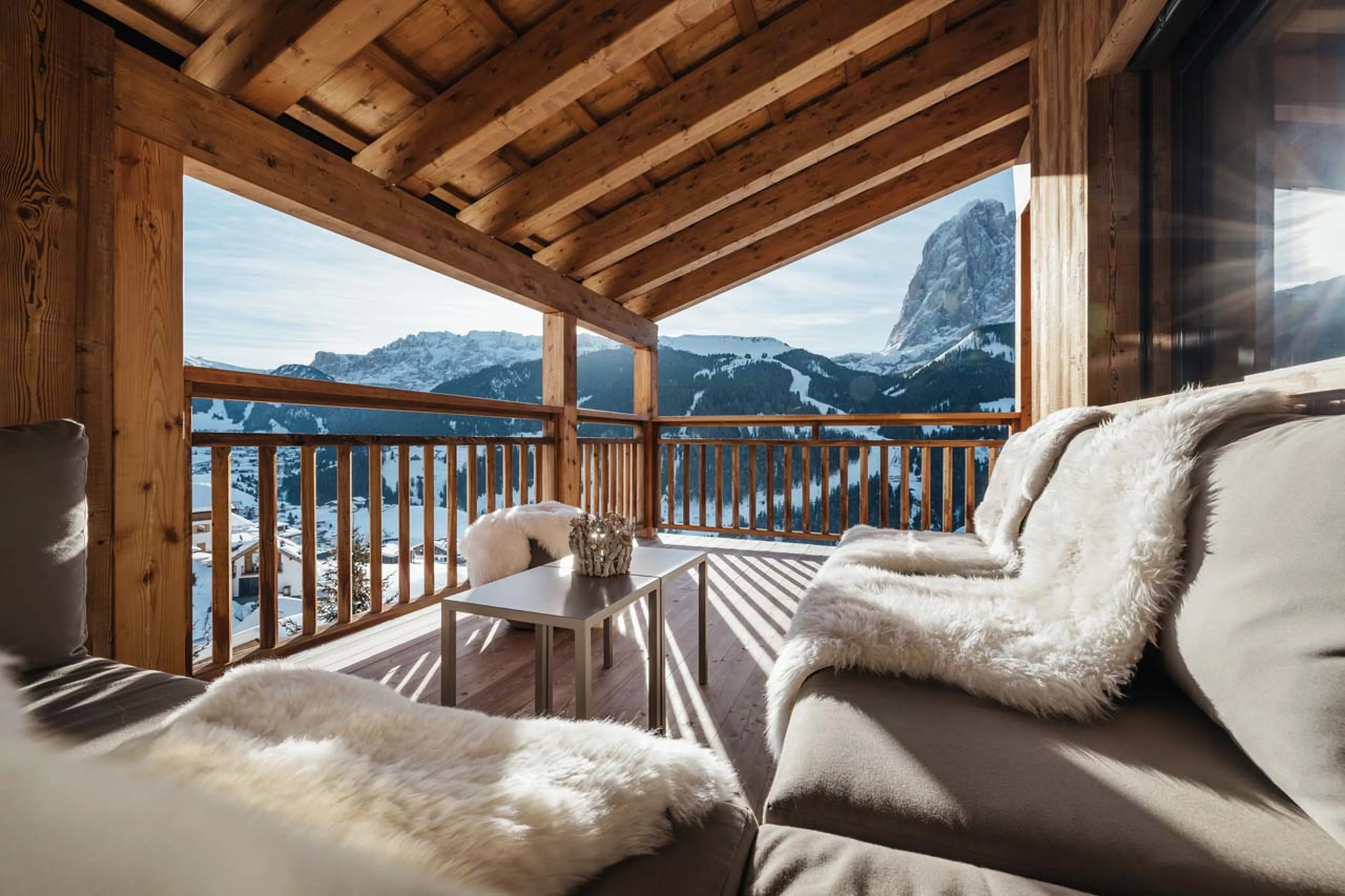 Comfortable outdoor seating with mountain views in Chalet Lefiro, Val Gardena
