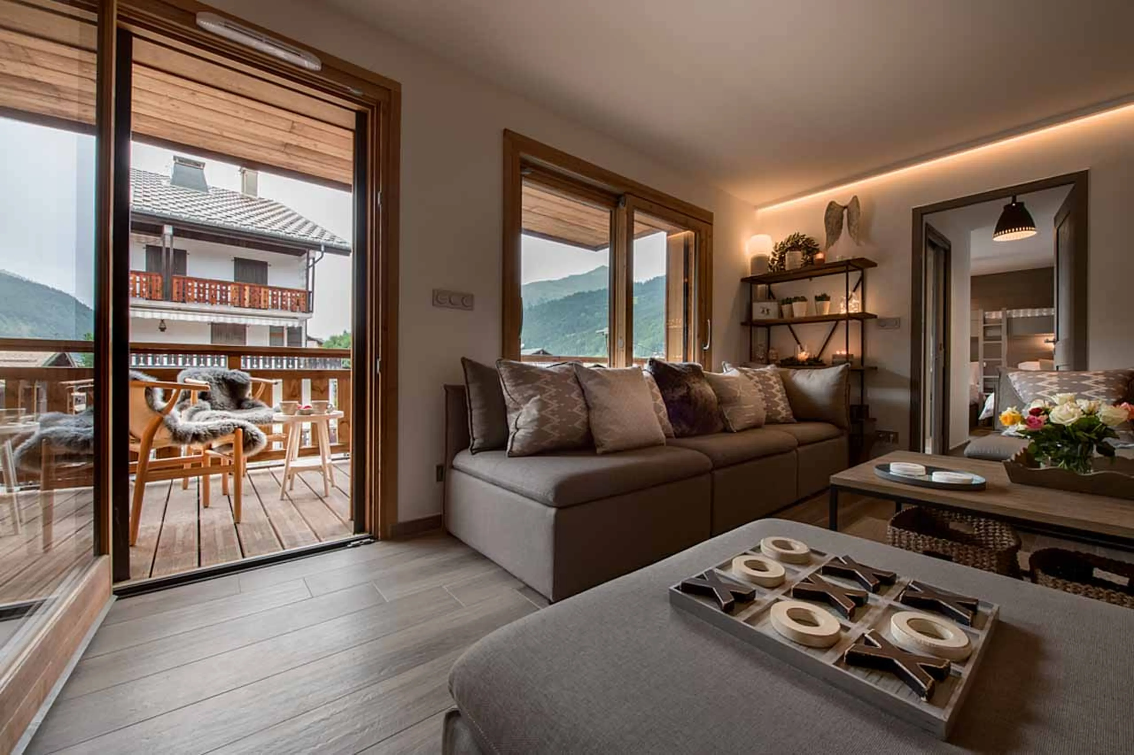 Living area and balcony at Apartment Les Abeilles in Morzine
