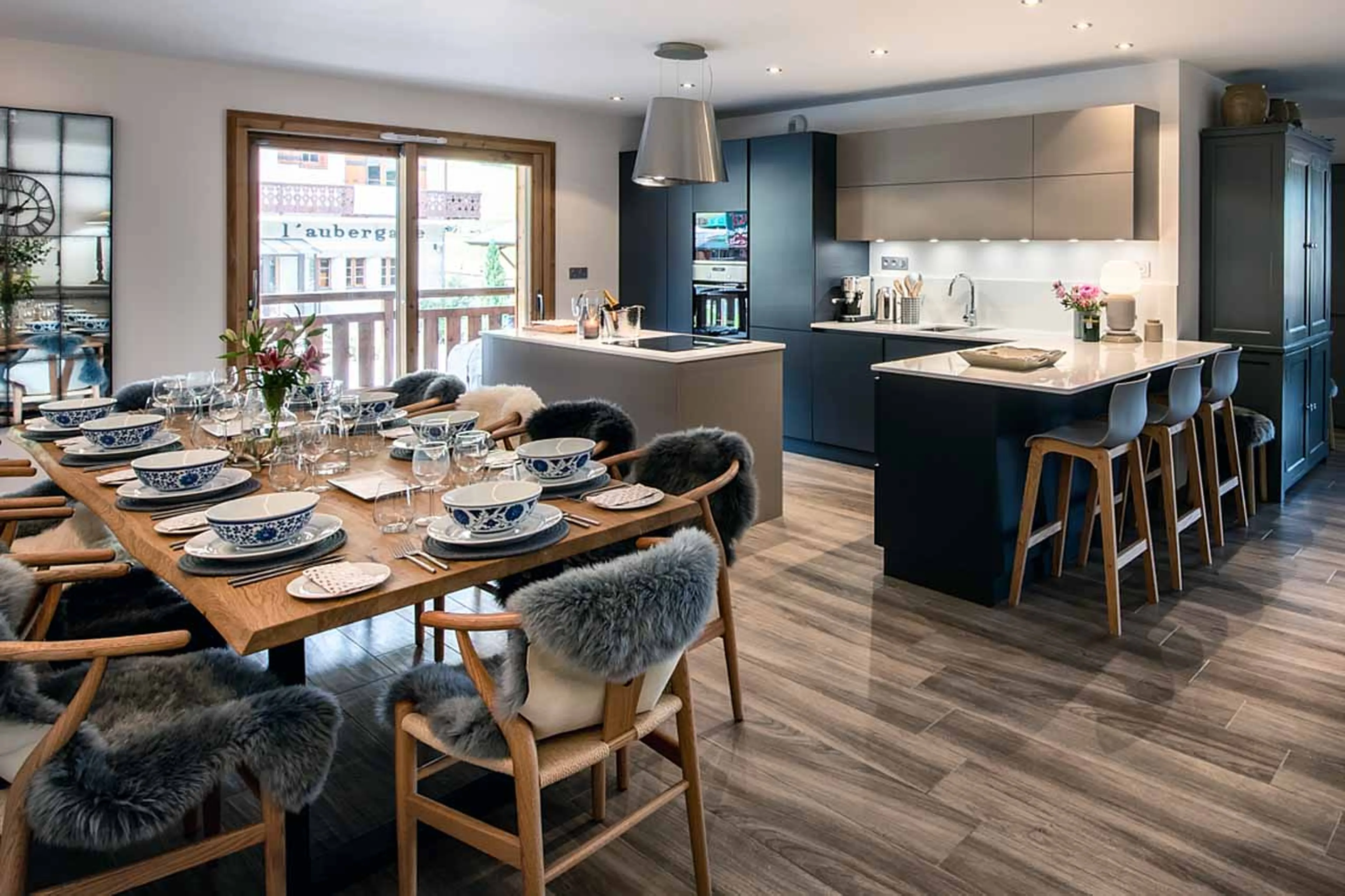 Dining table and kitchen at Apartment Les Abeilles in Morzine