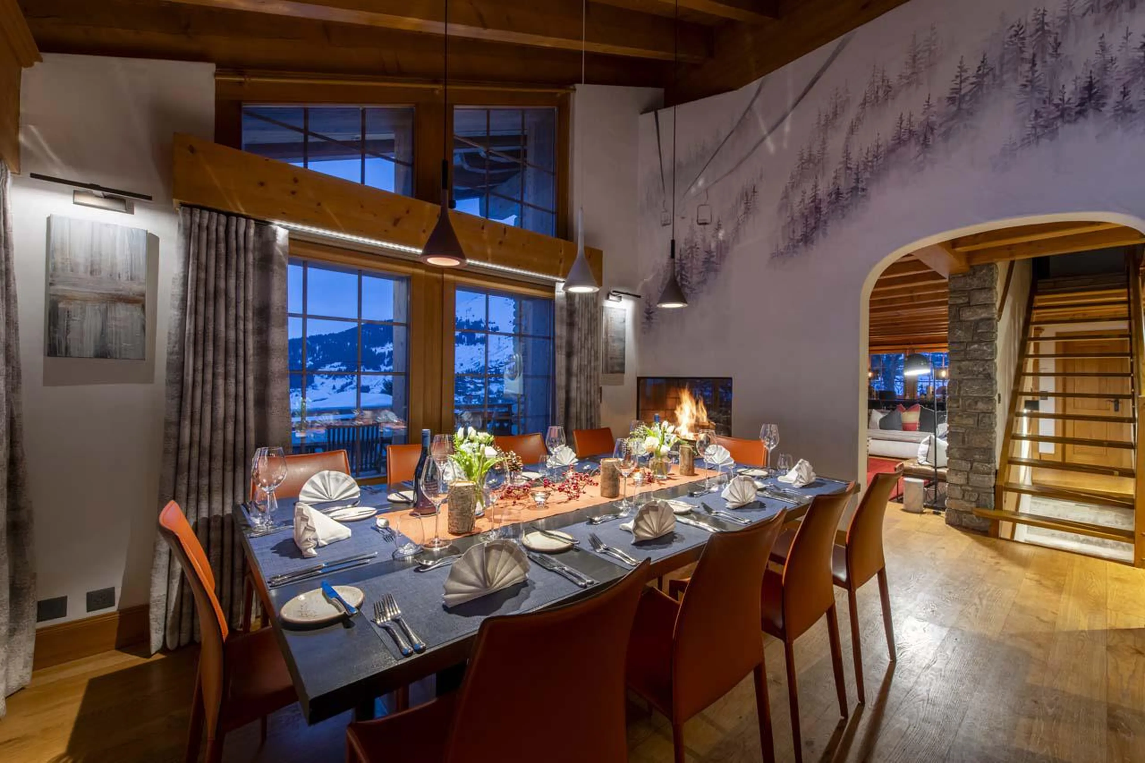 Fireplace in dining room at Chalet Les Attelas in Verbier