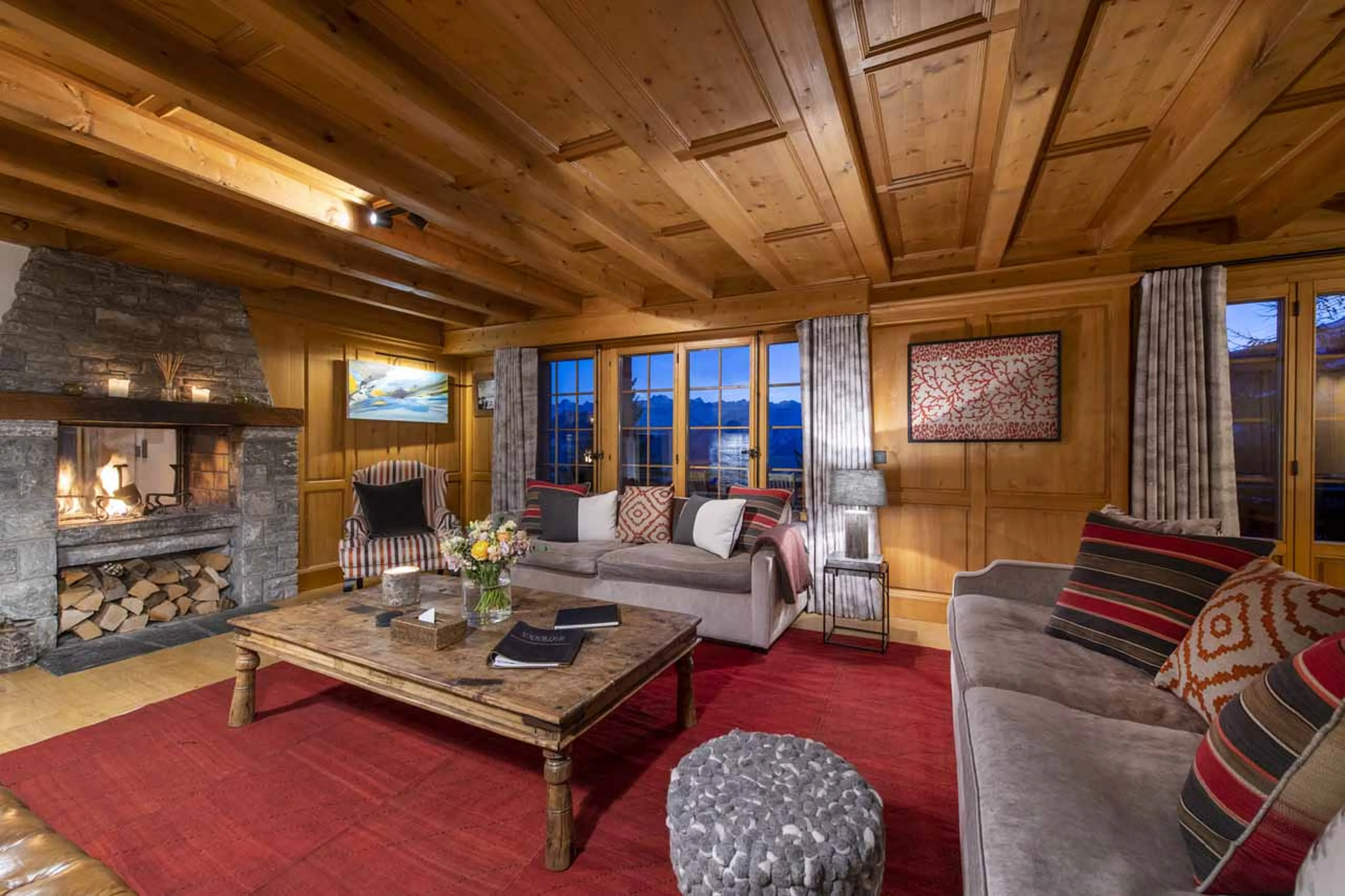 Fireplace in living area of Chalet Les Attelas in Verbier