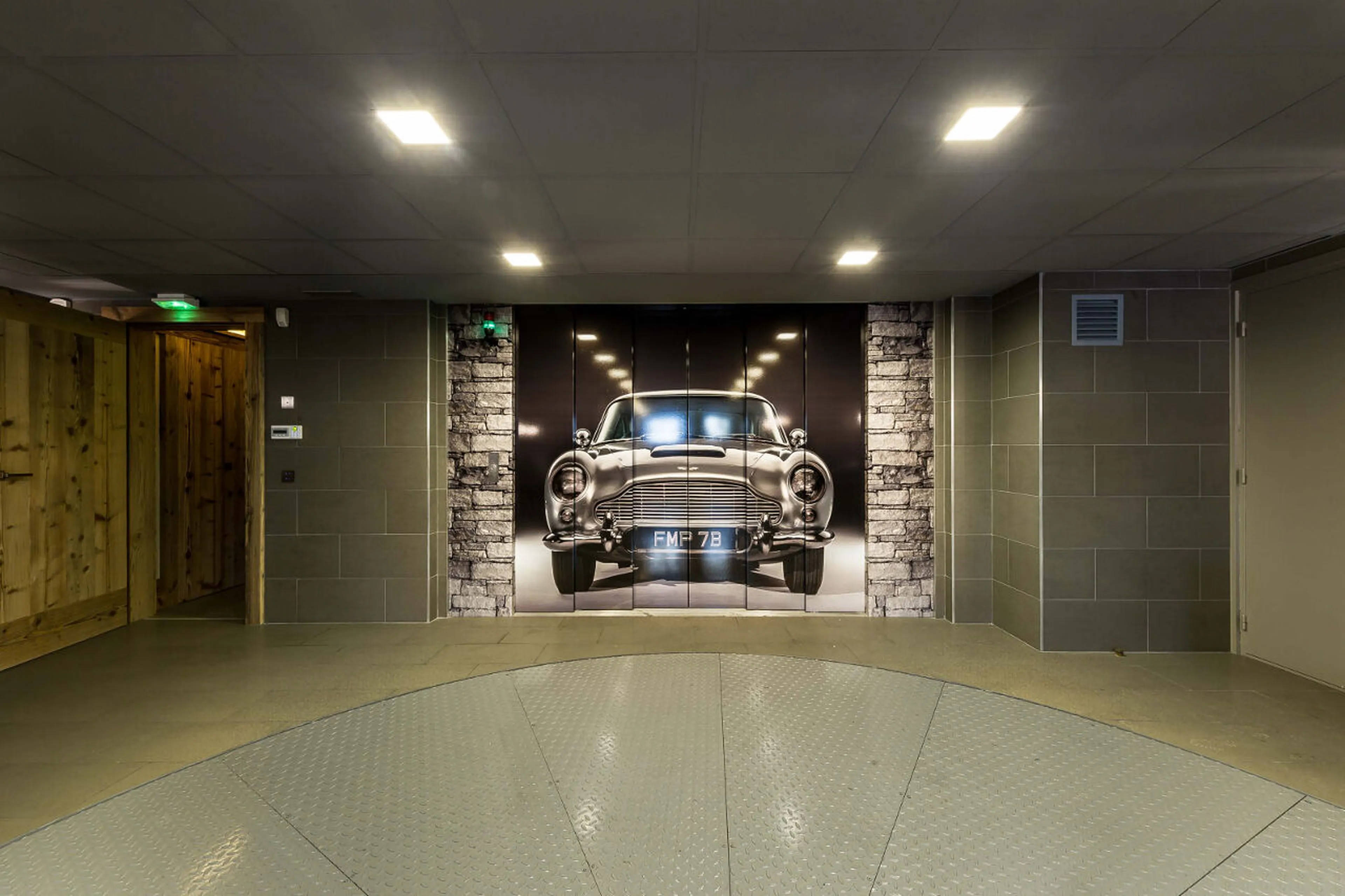 Underground garage with car lift in Chalet Les Bastidons  in Courchevel 1850