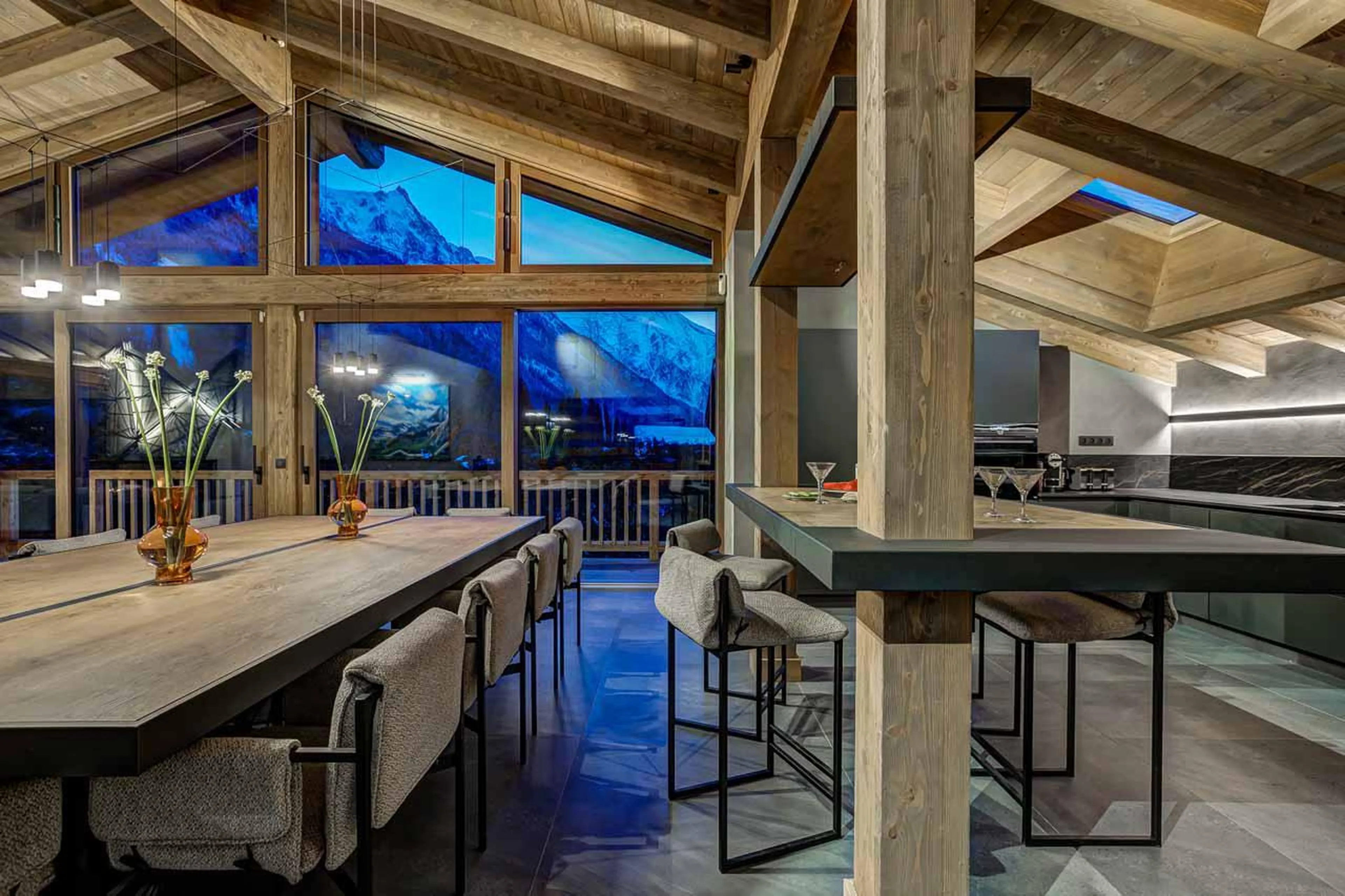 Dining area and kitchen at Chalet Les Melezes in Chamonix