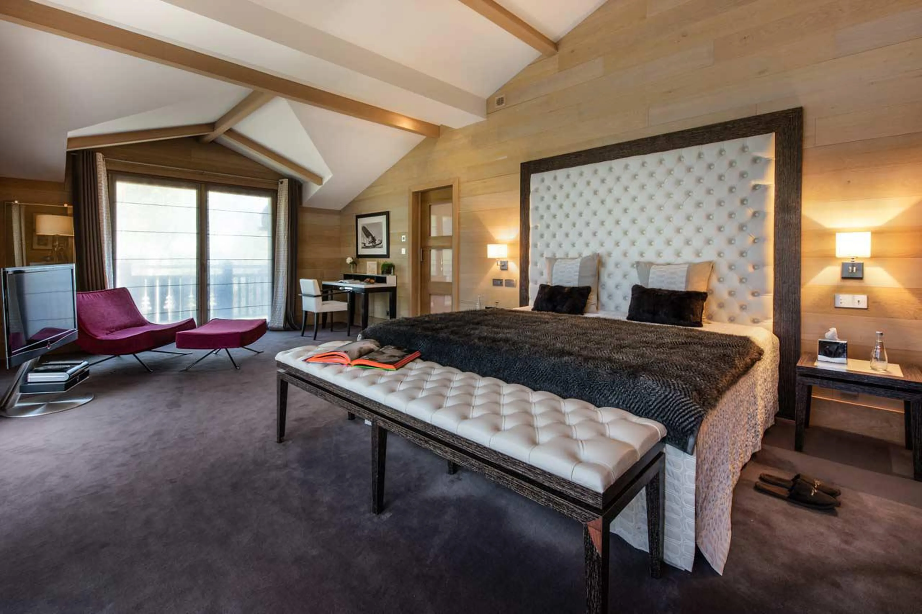 Master double bedroom with balcony access in Chalet Licorne des Neiges in Courchevel 1650