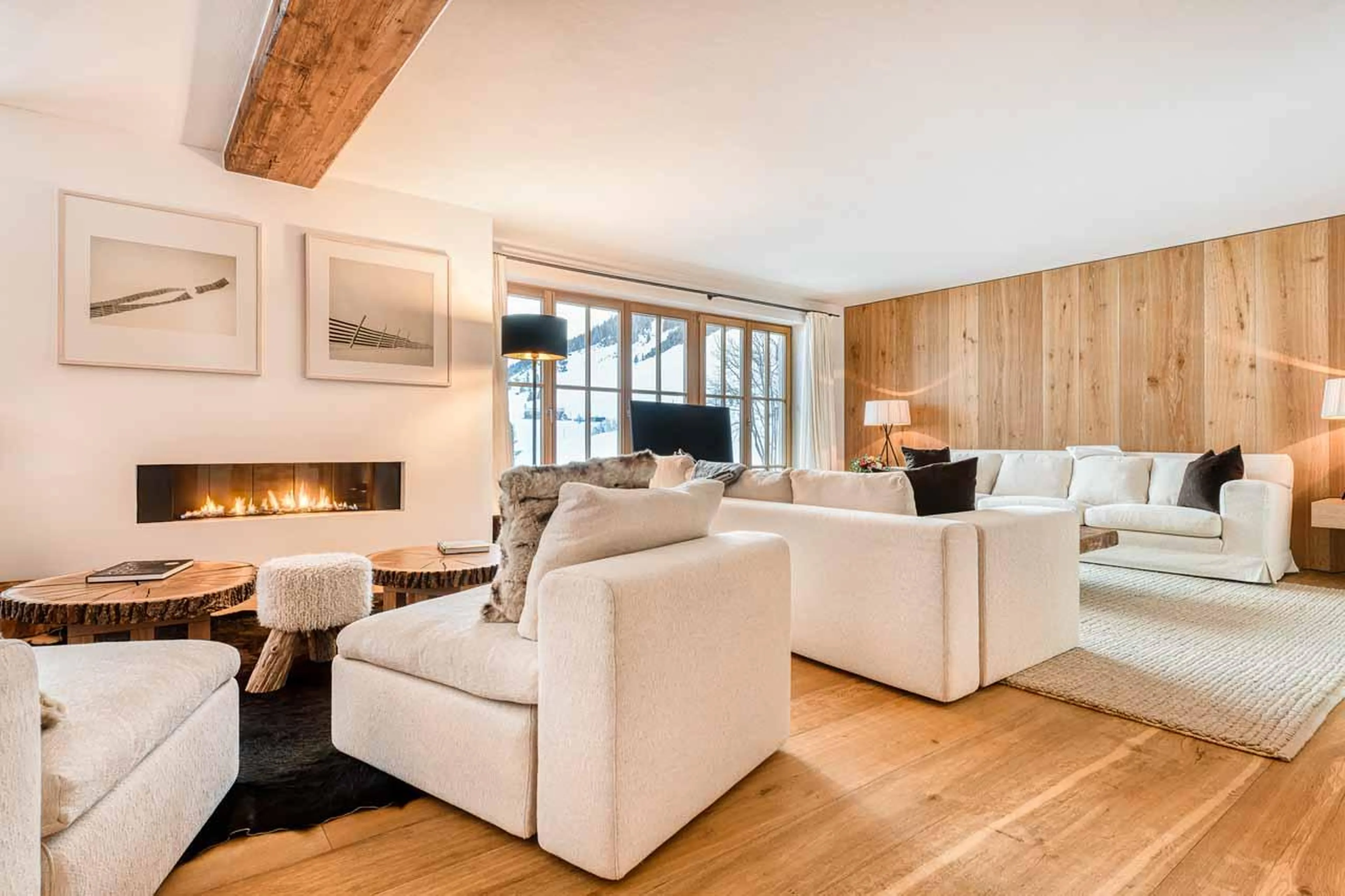 Spacious living area opening onto balcony at Chalet Lilly in Zug