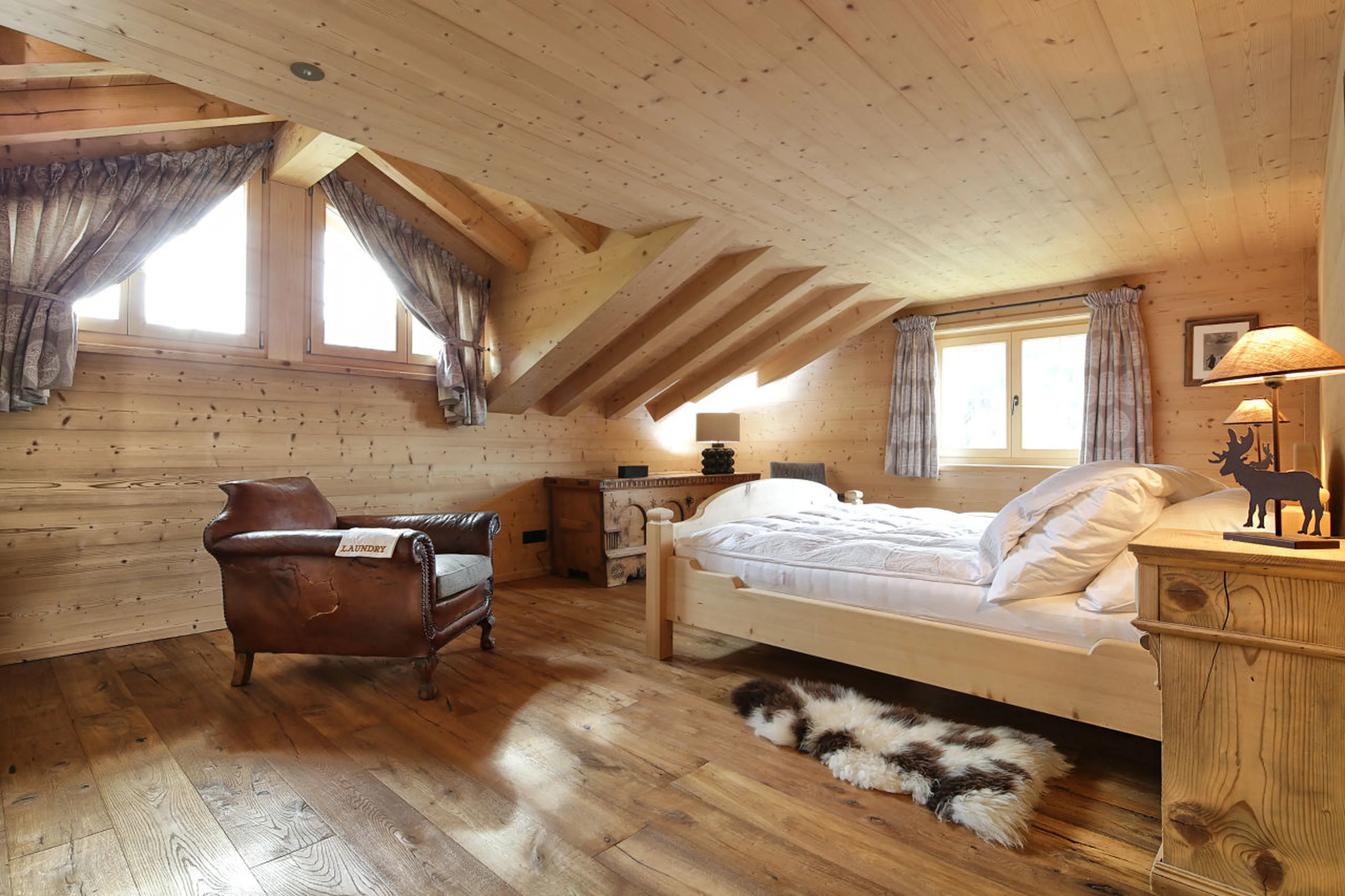 Master suite with dressing room in Chalet Luegisland in Klosters