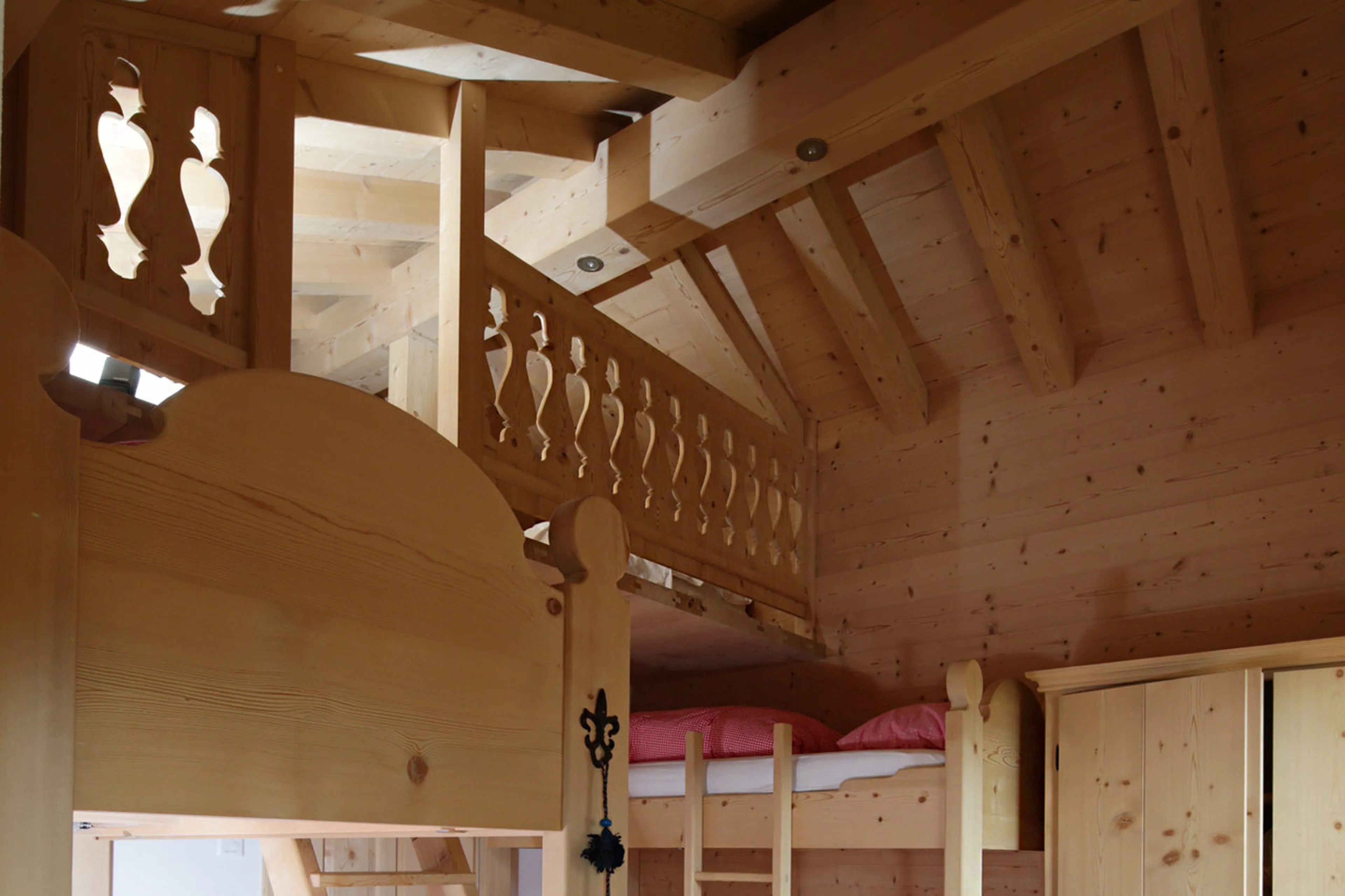 Bunk bedroom with space for two on mezzanine level in Chalet Luegisland in Klosters