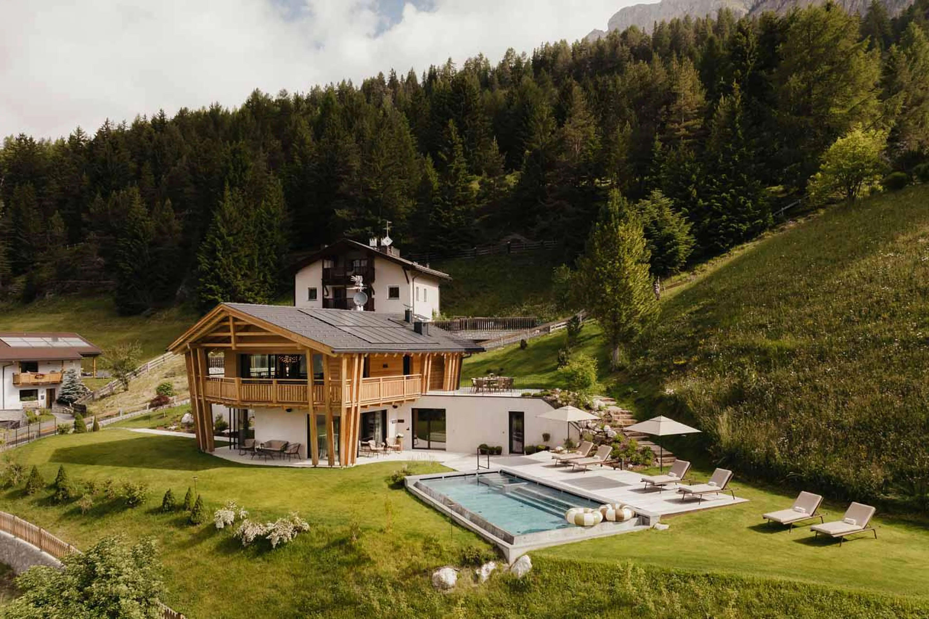 Exerior of Chalet Lum d'Or in Val Gardena in summer