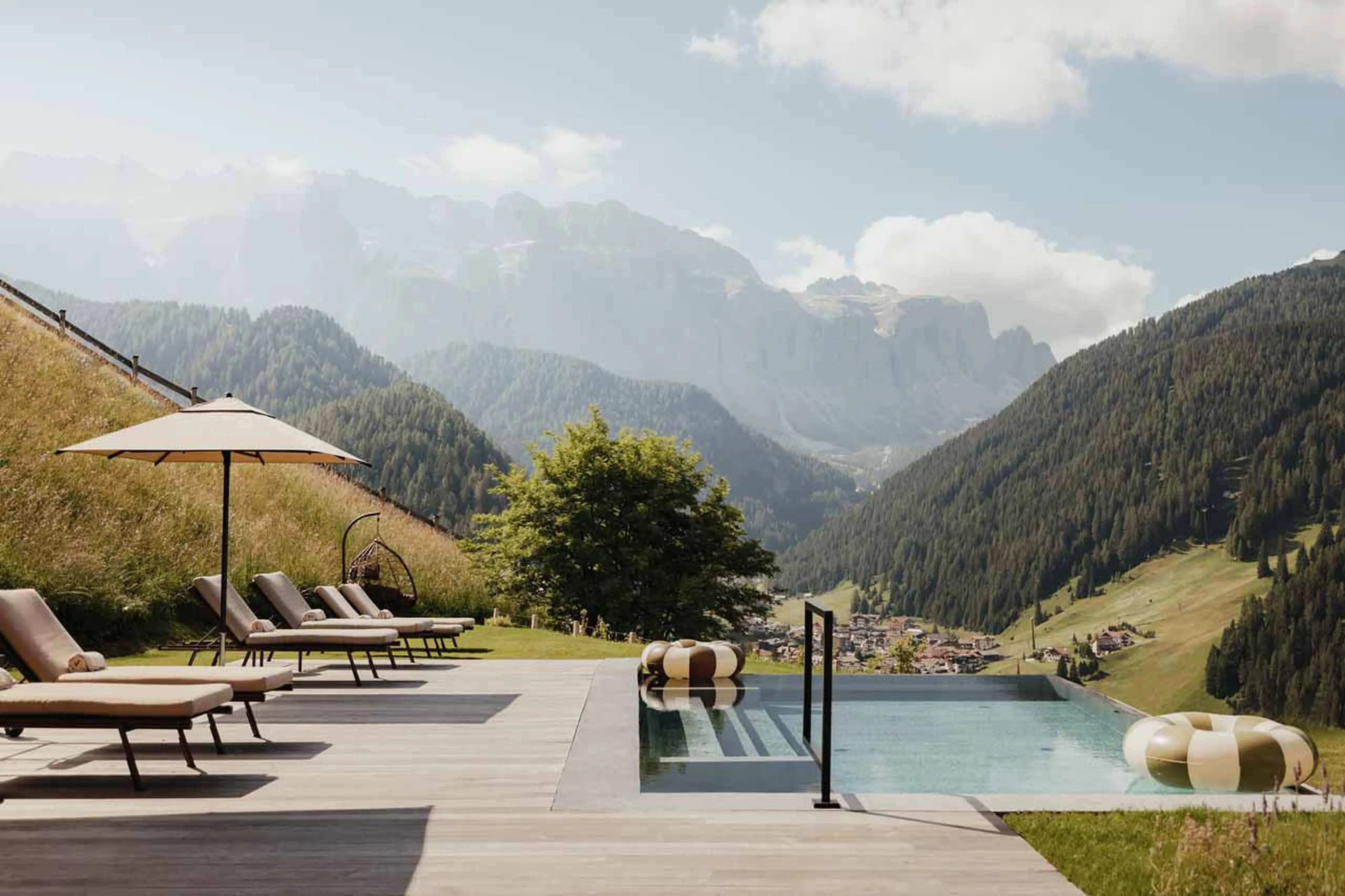 Pool and terrace at Chalet Lum d'Or in Val Gardena