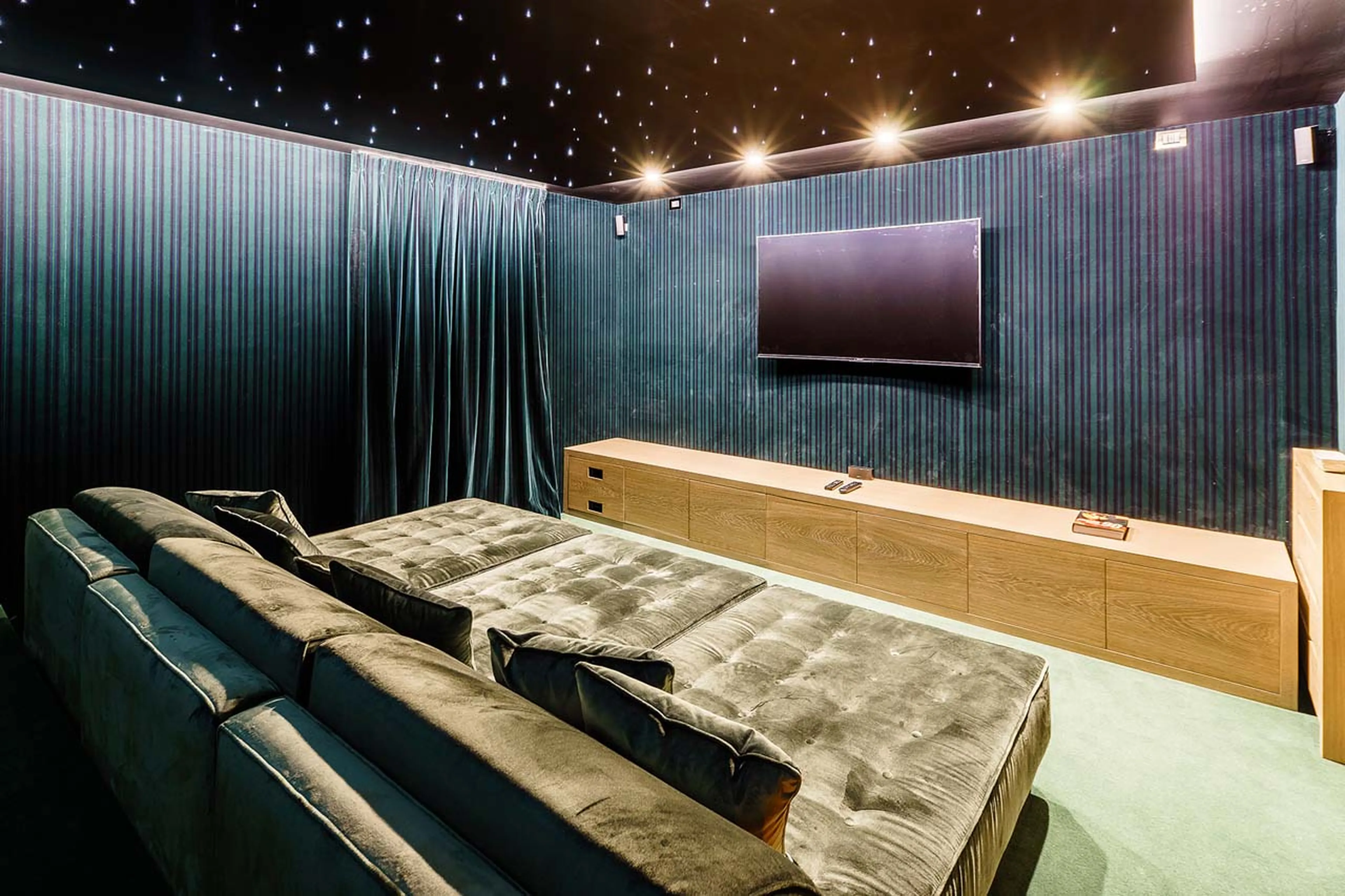 Comfortable seating in cinema room at Chalet LV | 01 in Cortina