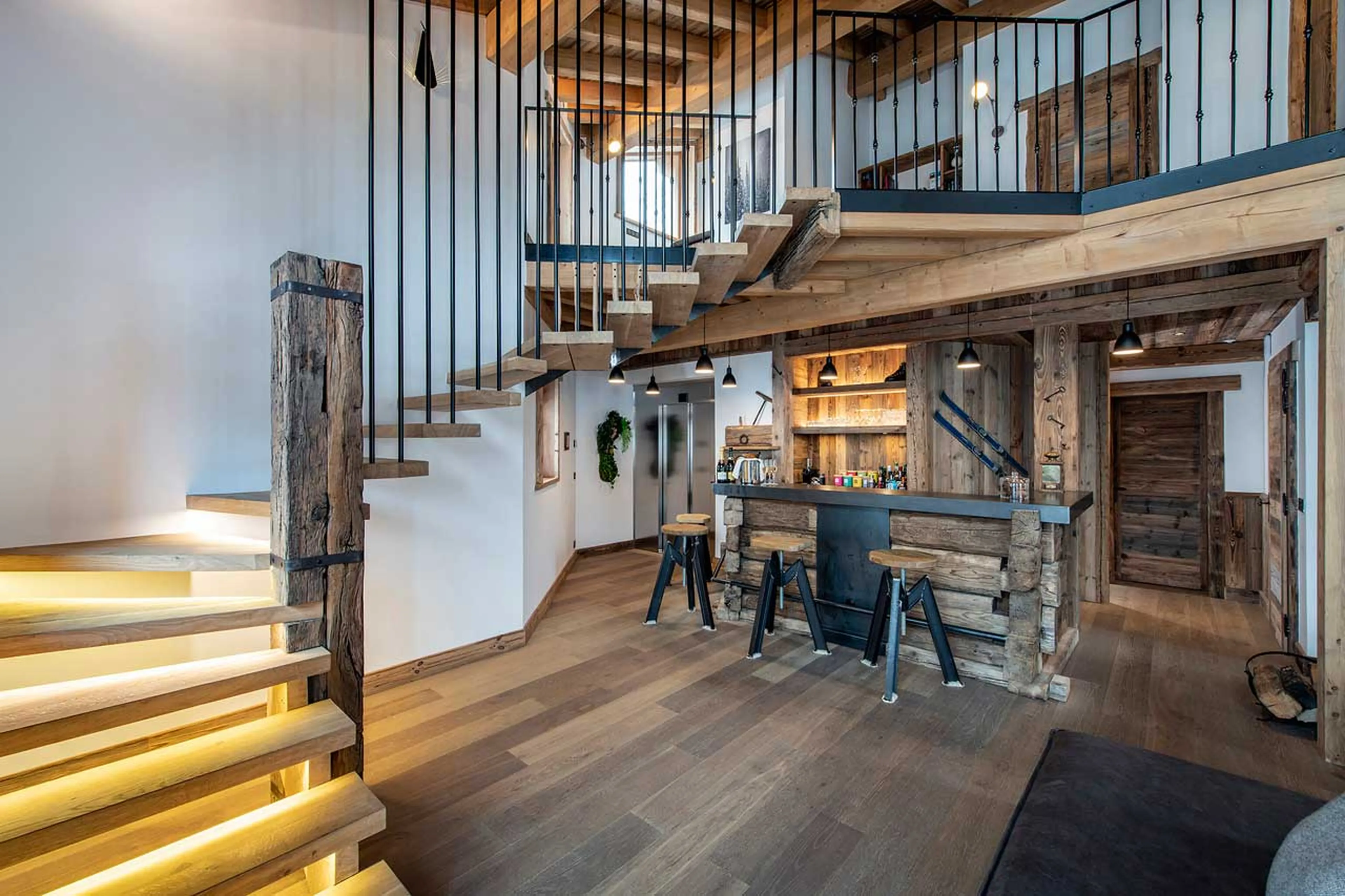 Staircase and bar at Chalet Machapuchare in Val d'Isere