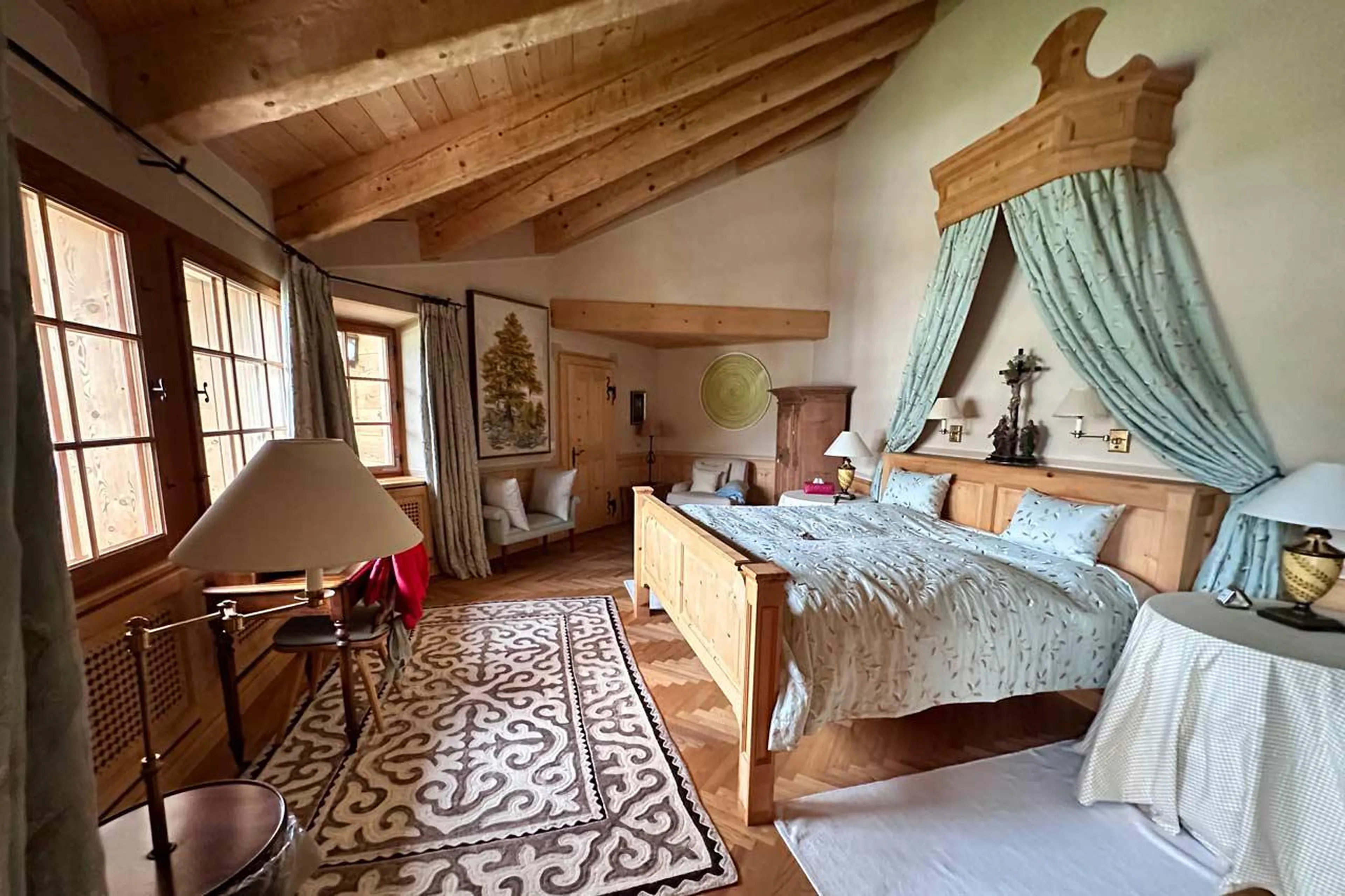 Master double en-suite bedroom with mountain-view, dressing room and balcony access in Chalet Macun