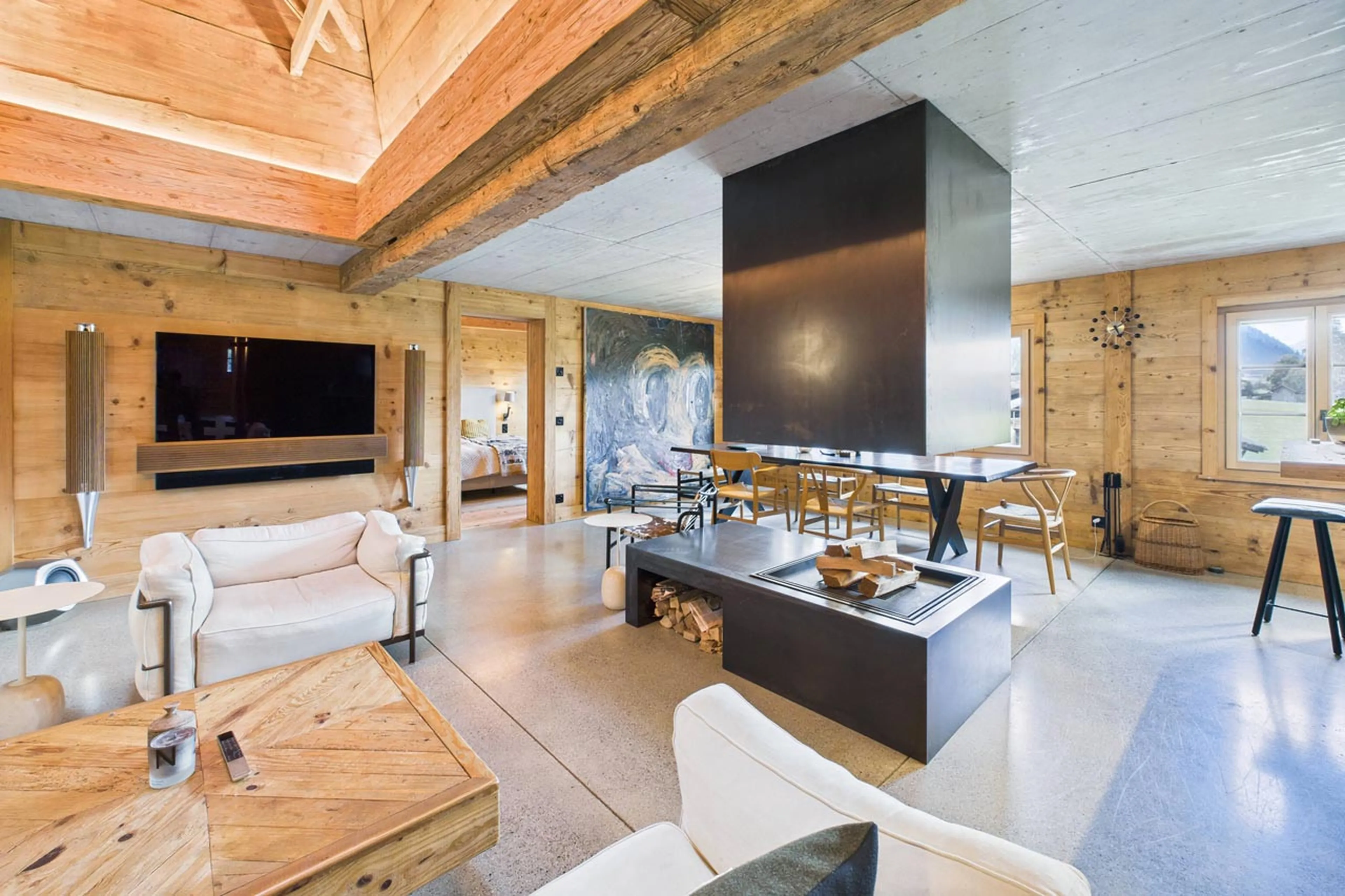 Open-plan living area at Chalet Mannenberg near Gstaad