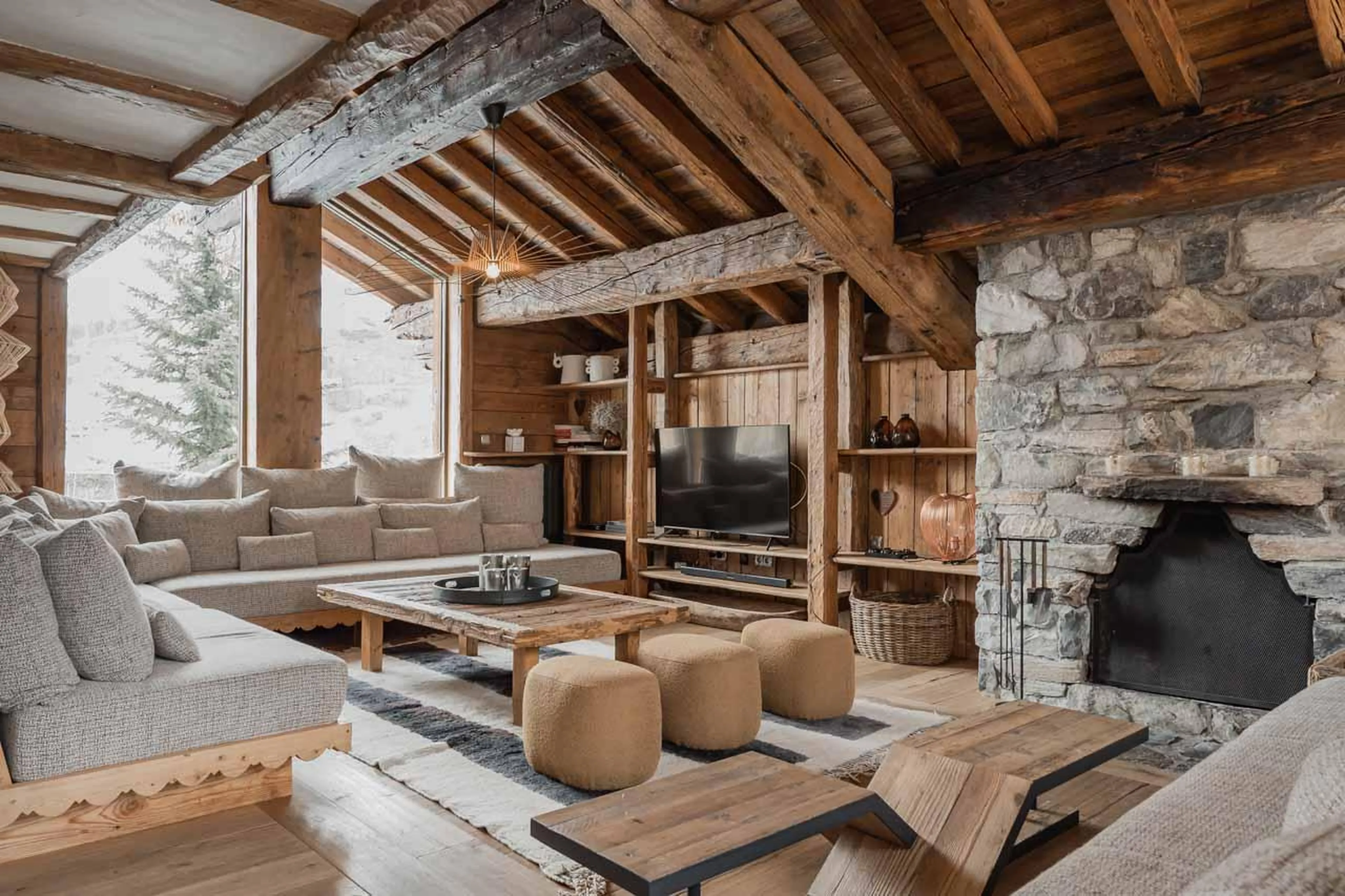 Fireplace in living area in Chalet Mathilda, Val d'Isere