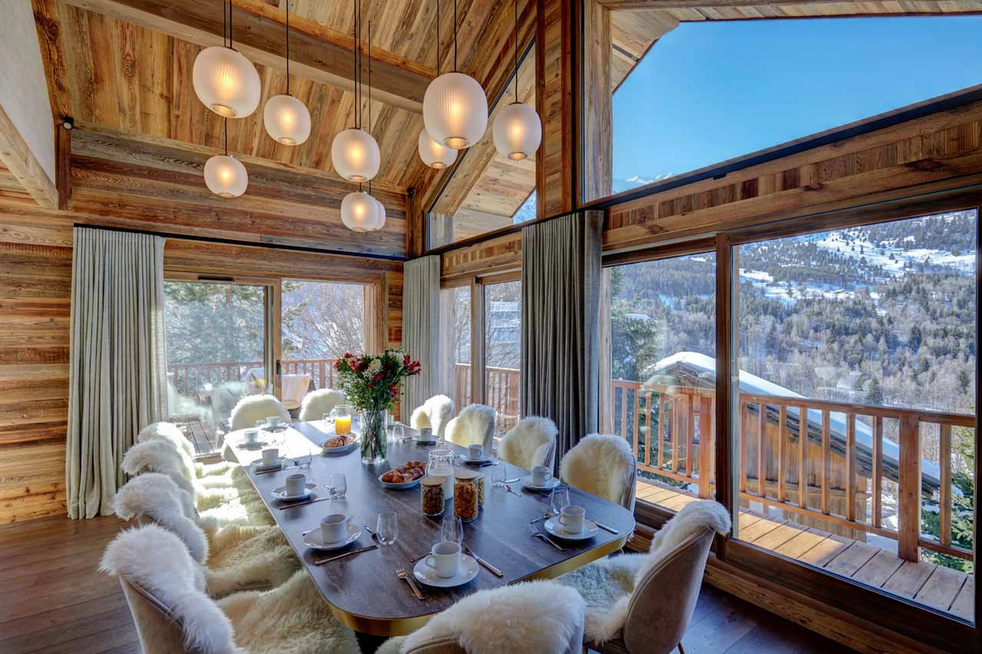 Mountain views from dining table of Chalet Menor in Meribel